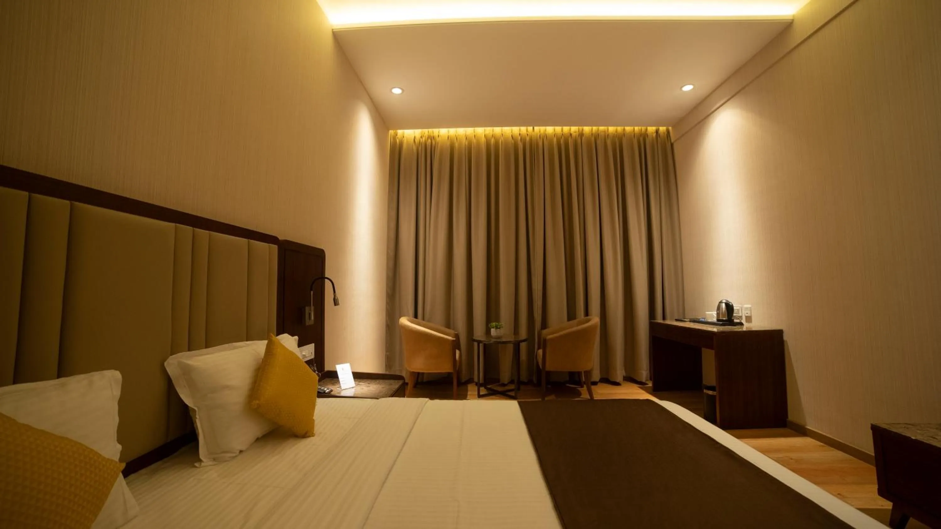 Bed in HOTEL RAJHANS ABHINANDAN