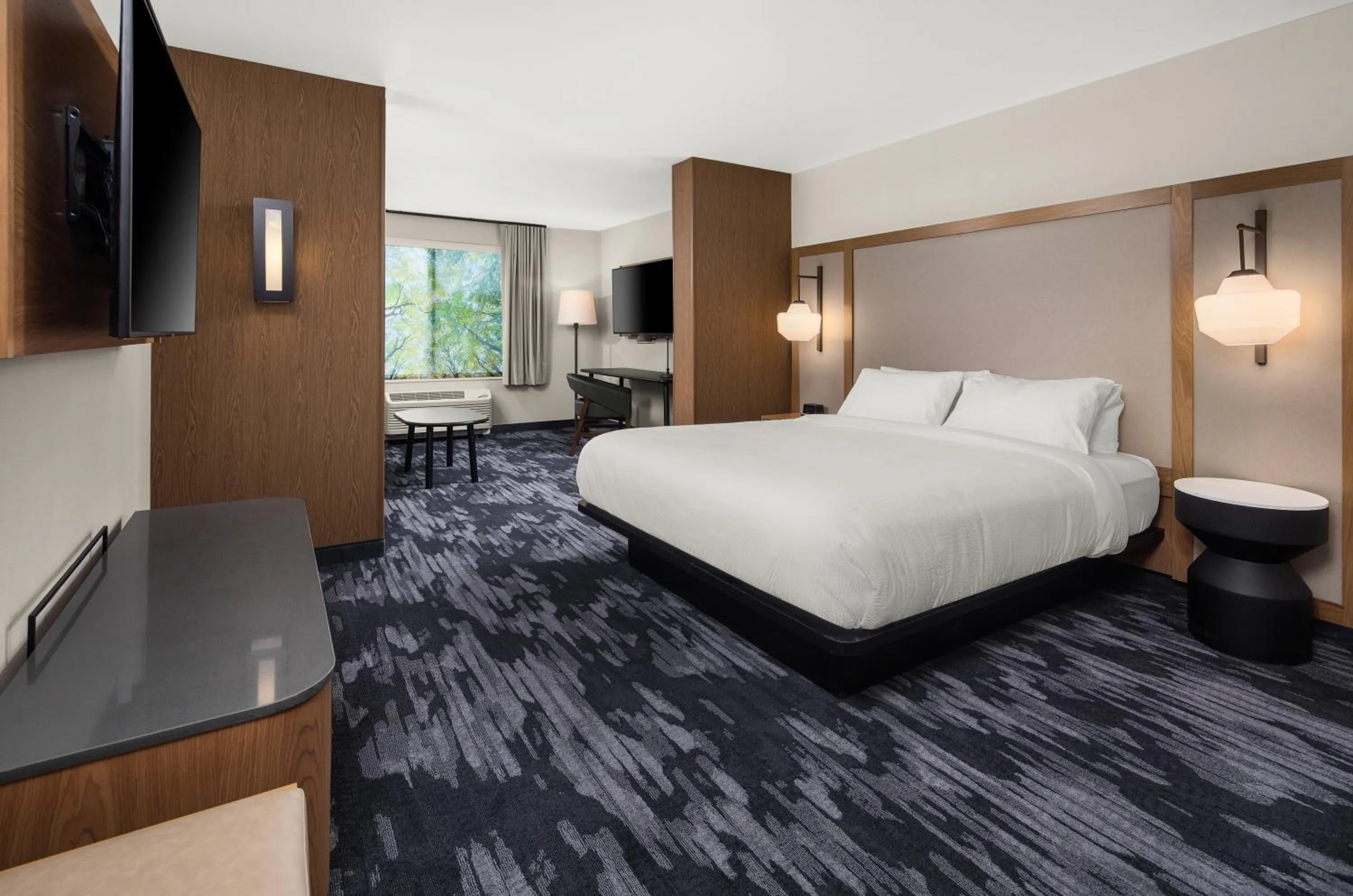 Seating area, Bed in Fairfield by Marriott Inn & Suites Duluth