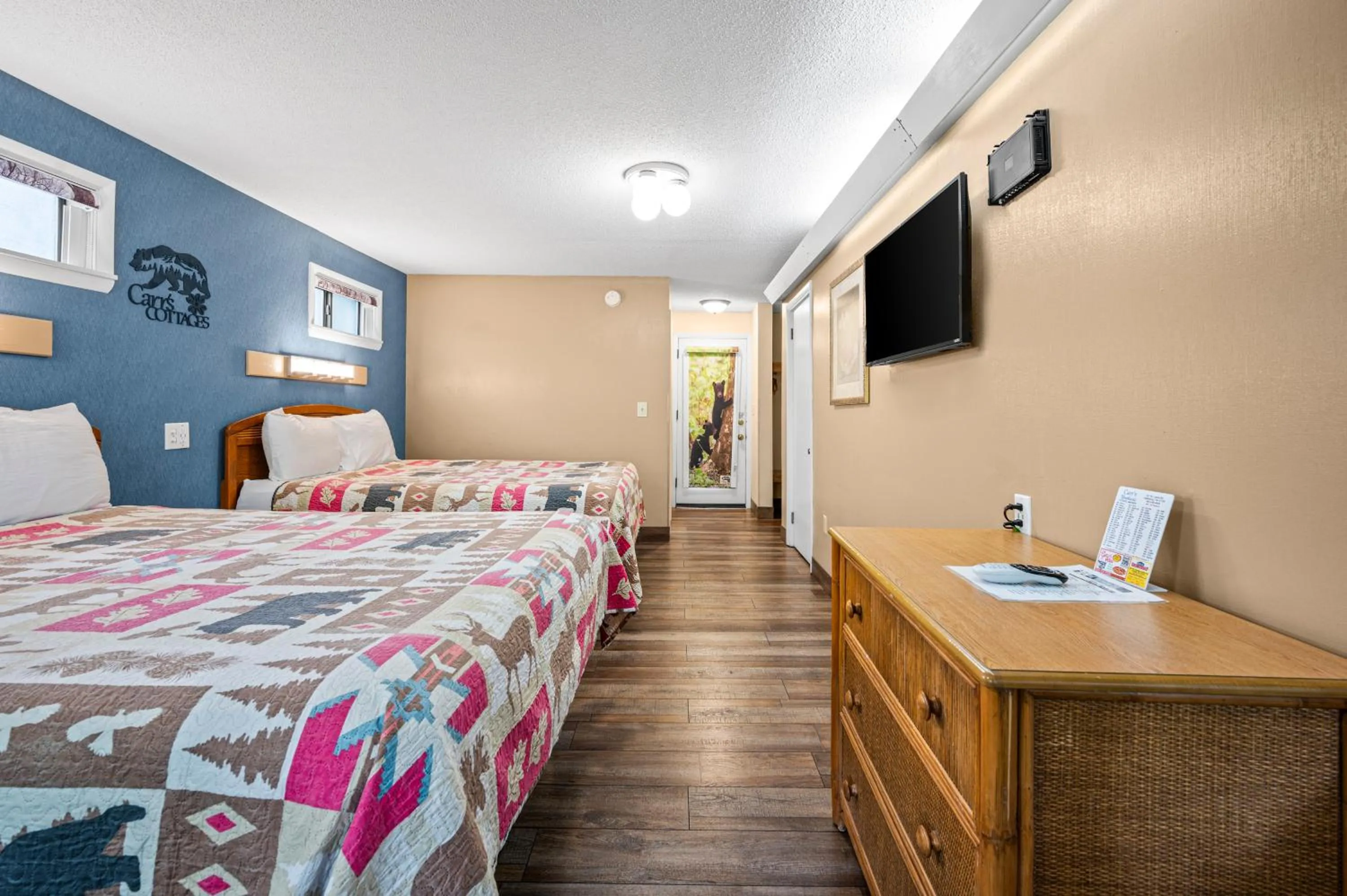 Bed in Carr's Northside Hotel and Cottages