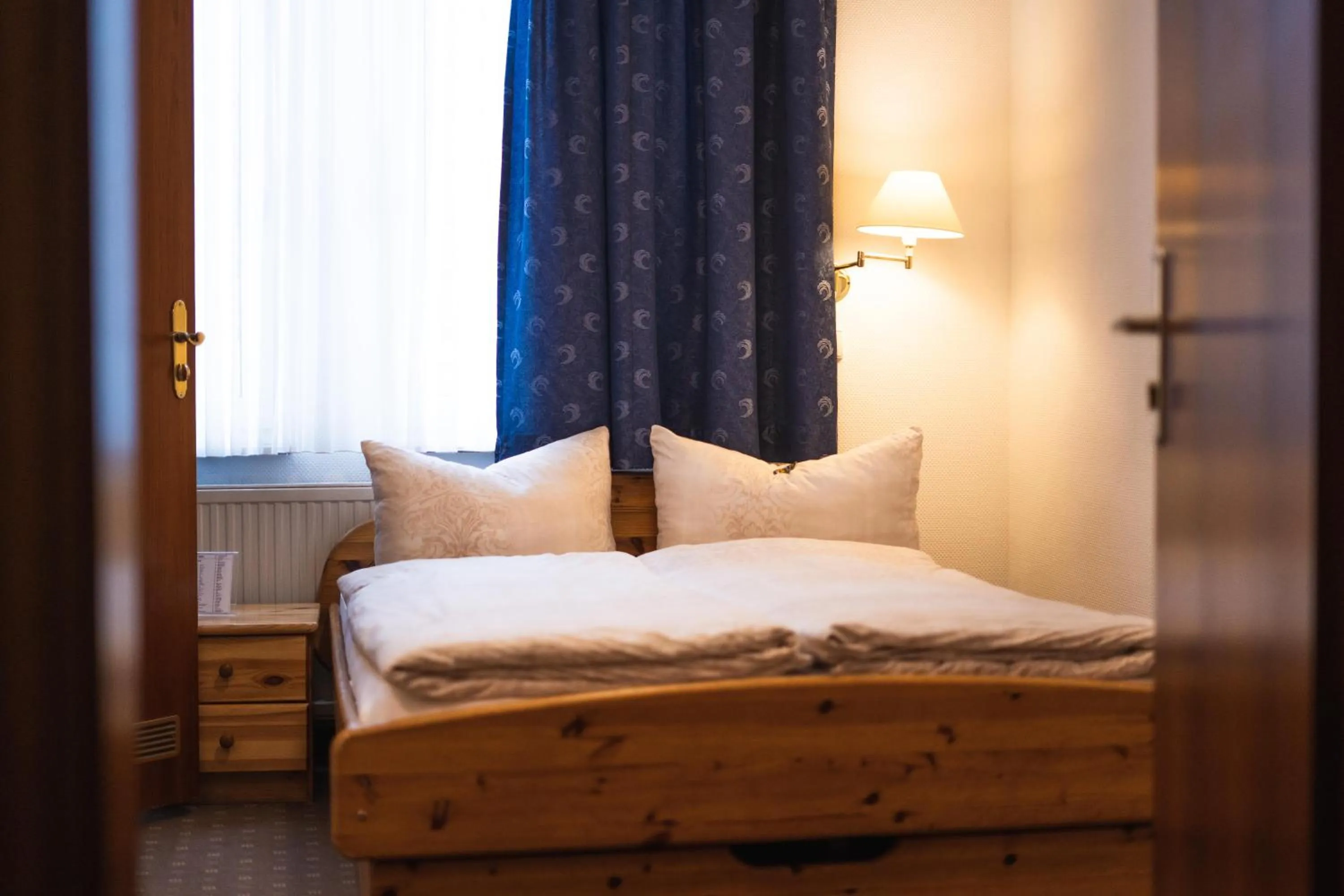 Photo of the whole room, Bed in Pension am Heusteig