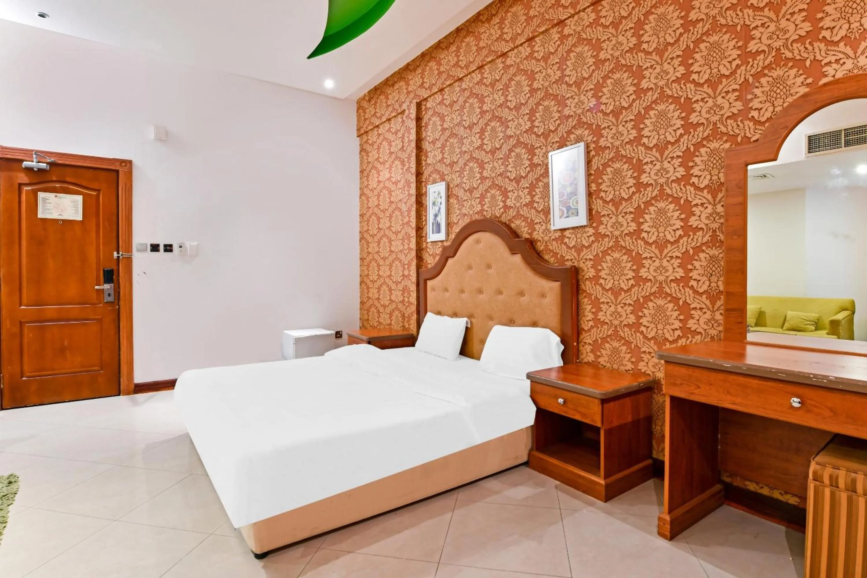 Bedroom, Bed in OYO 118 Revira Hotel