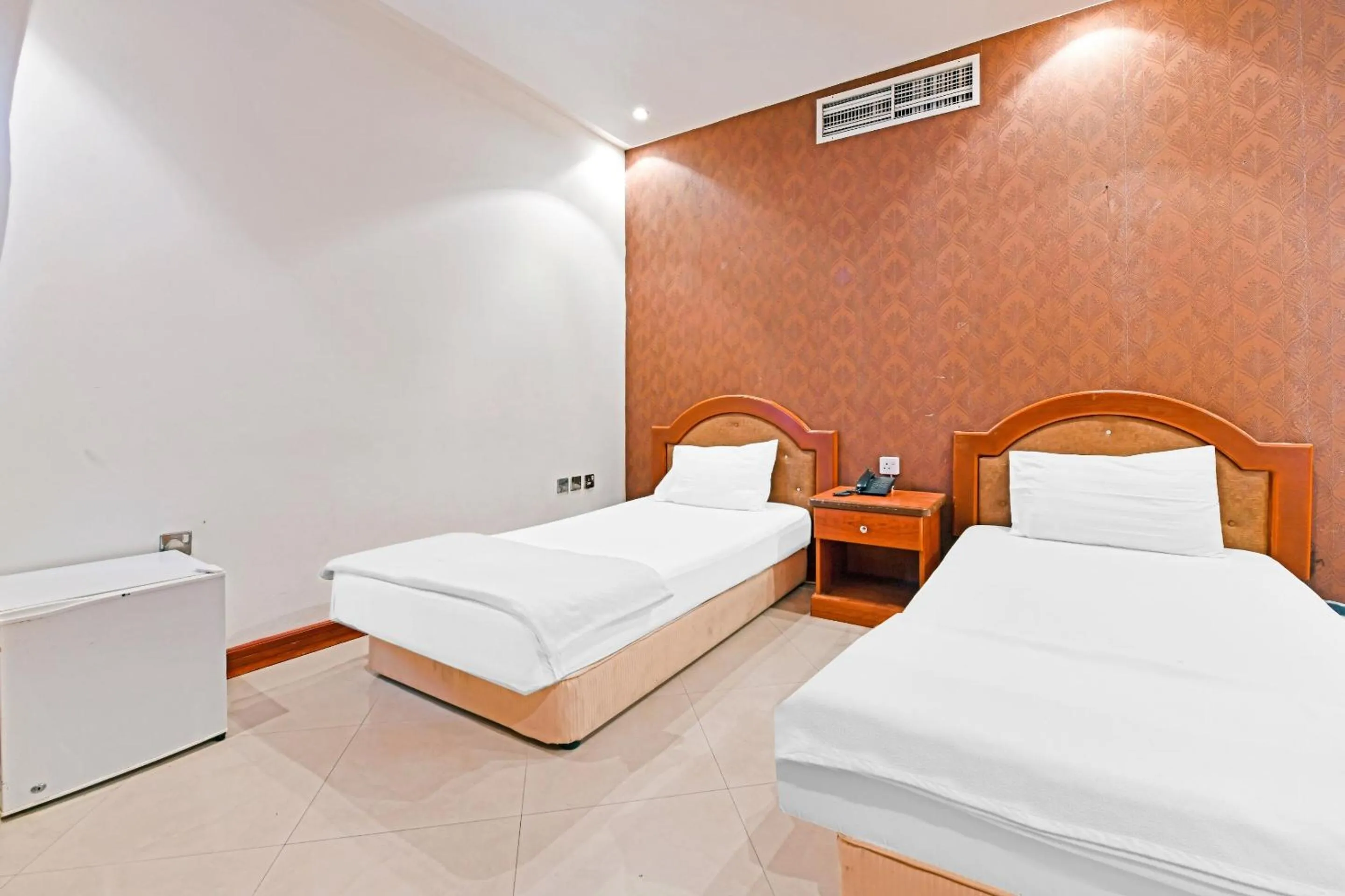 Bedroom, Bed in OYO 118 Revira Hotel