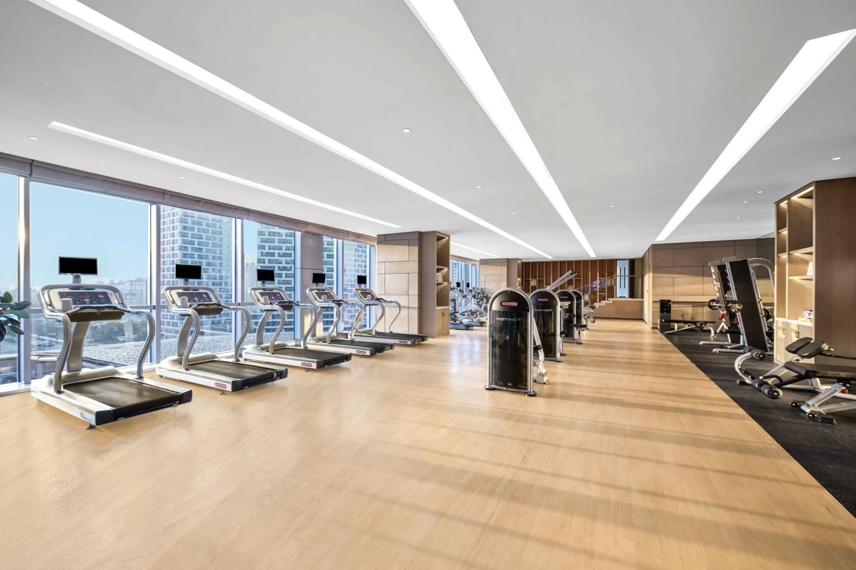 Fitness centre/facilities in Vignette Collection Hangzhou Huaxia Center Hotel by IHG