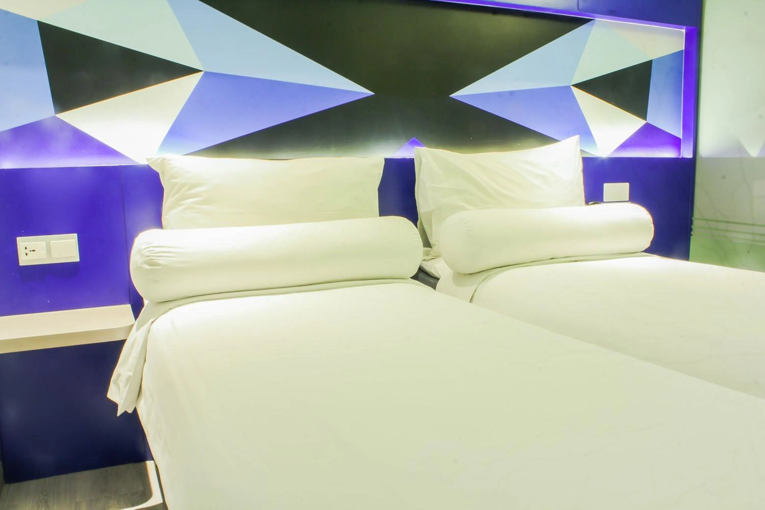 Bed in MD 7 Hotel Cirebon