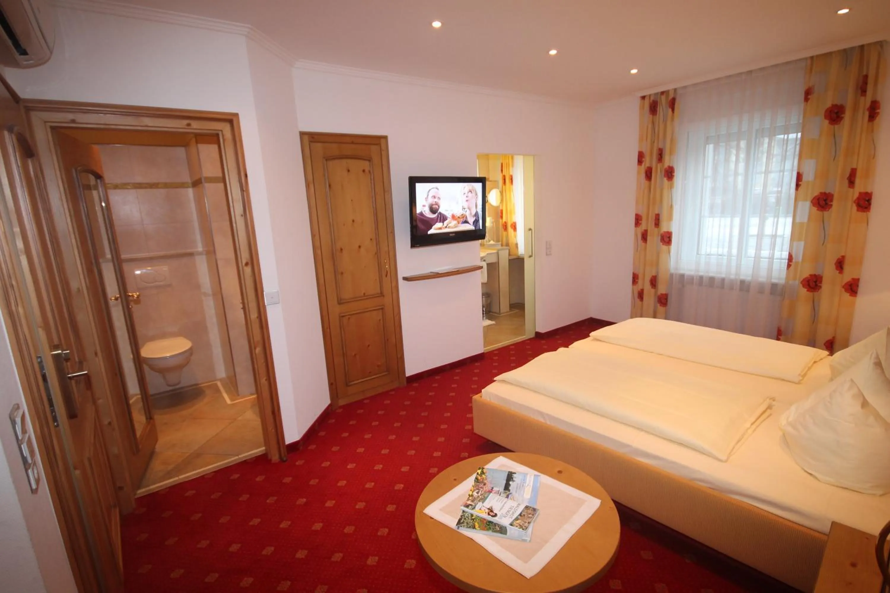 Photo of the whole room, Bed in Wohlfühlhotel Bercher