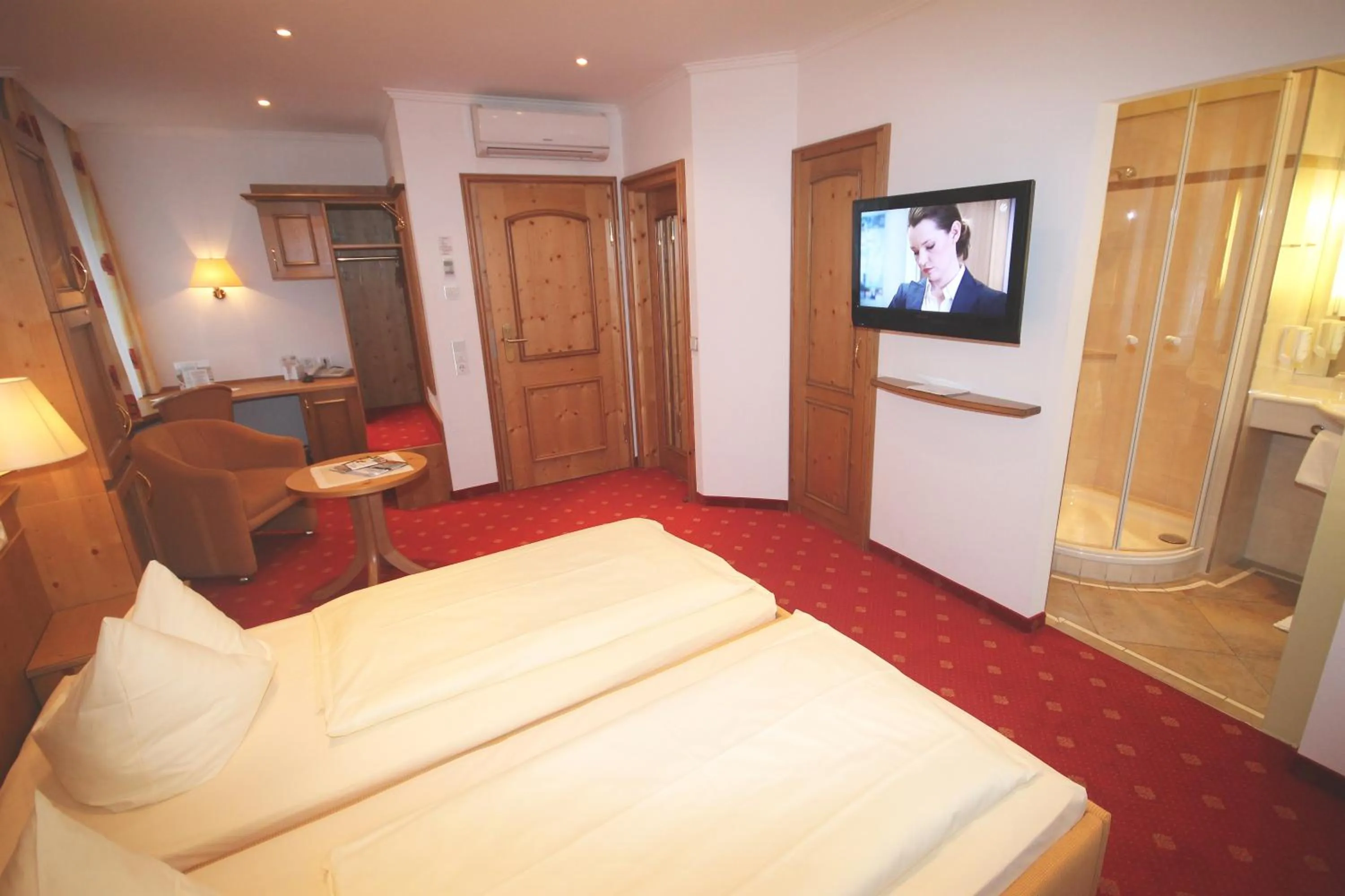 Photo of the whole room, Bed in Wohlfühlhotel Bercher