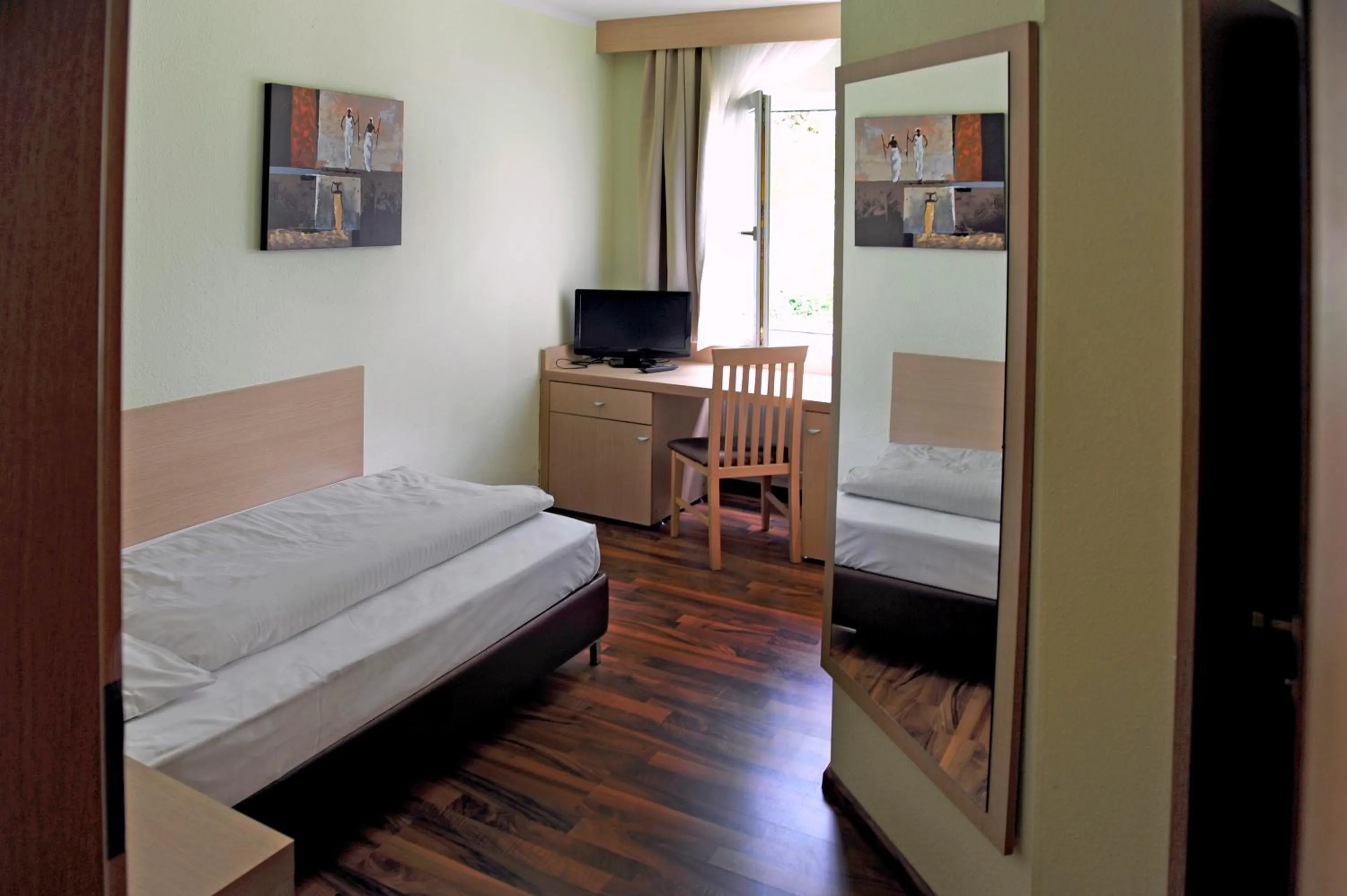 Photo of the whole room, Bed in Hotel Tannenhof