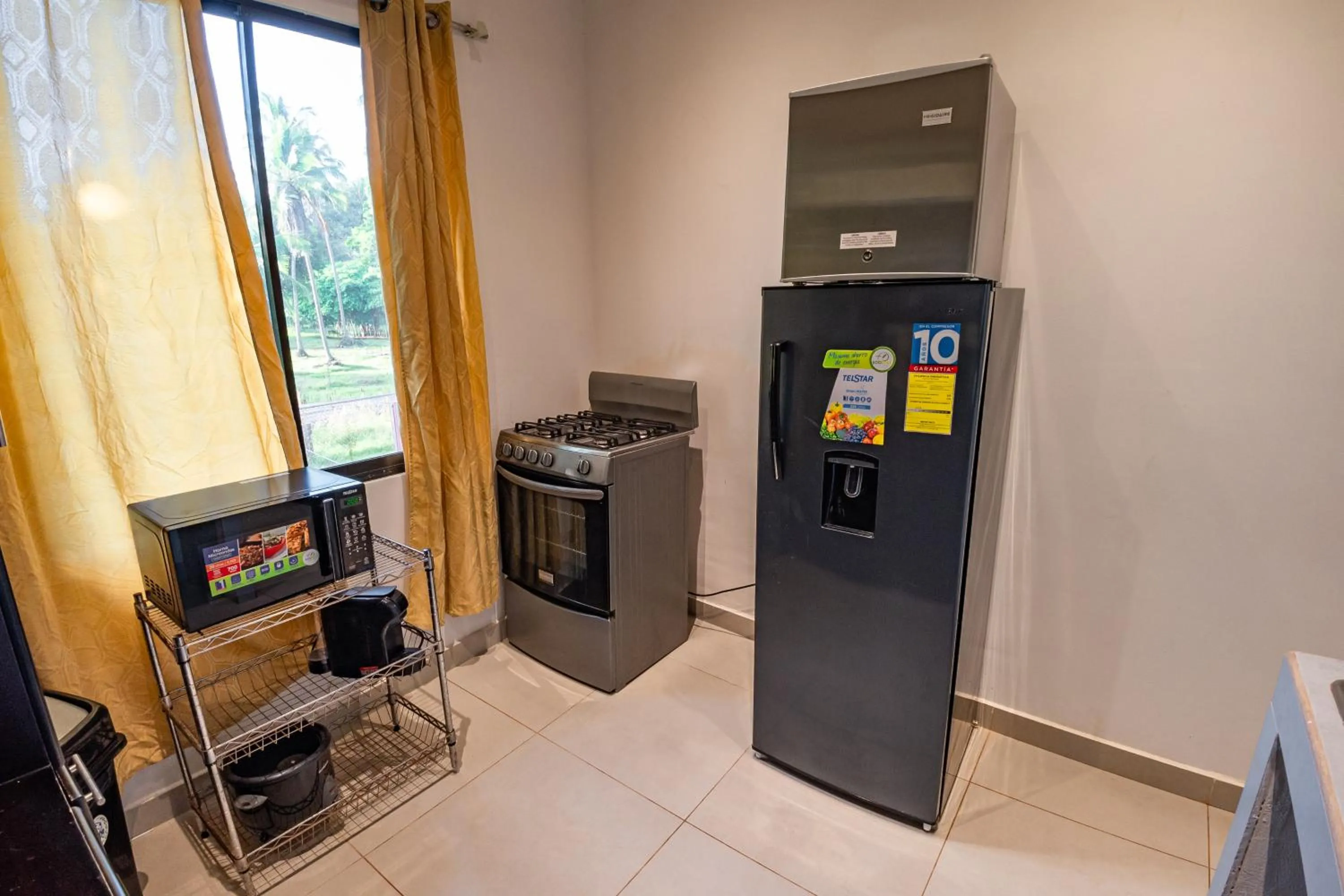 Kitchen or kitchenette in Sunset del Mar Beach Resort