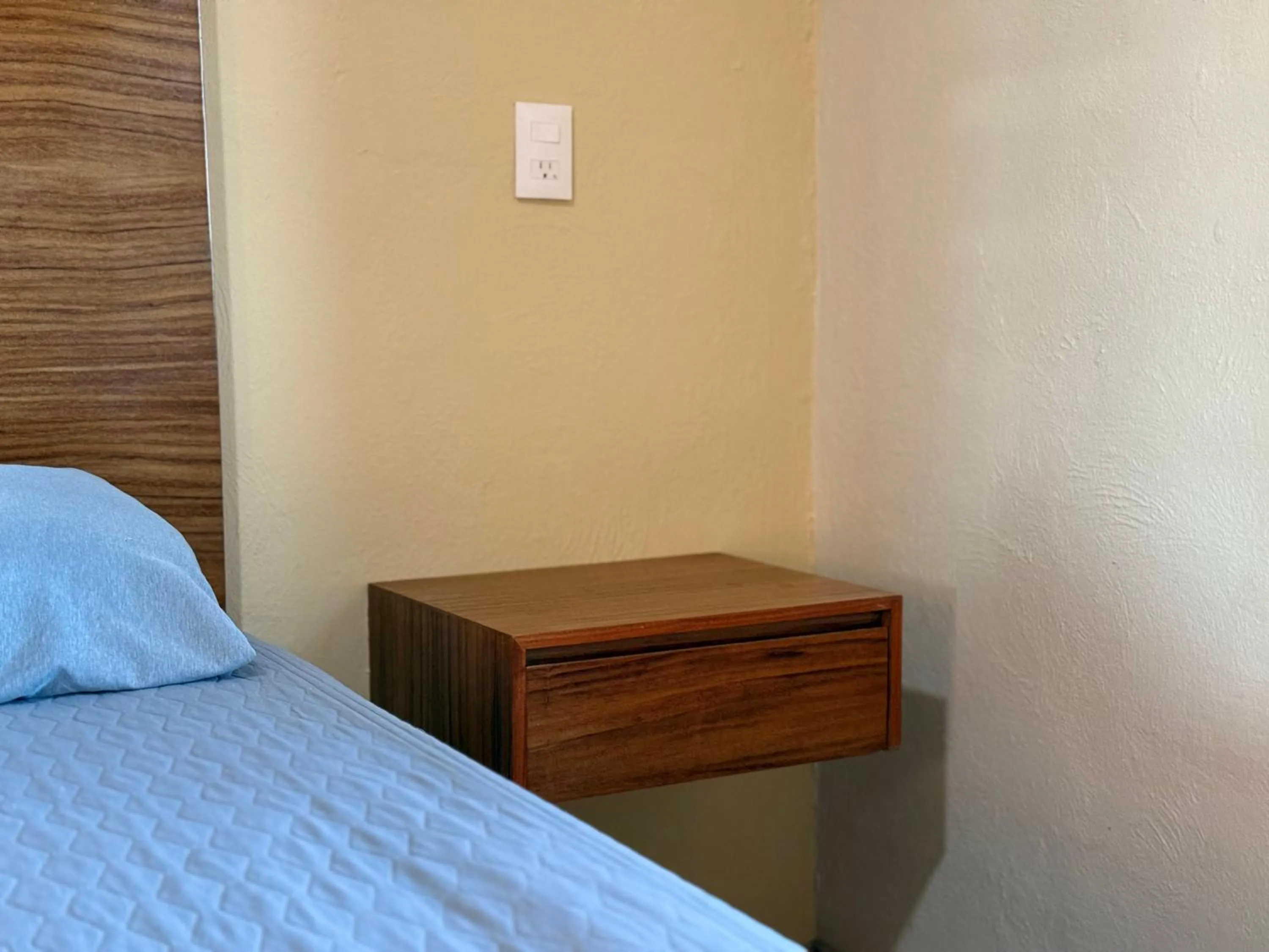 Bed in Departamentos Tequila