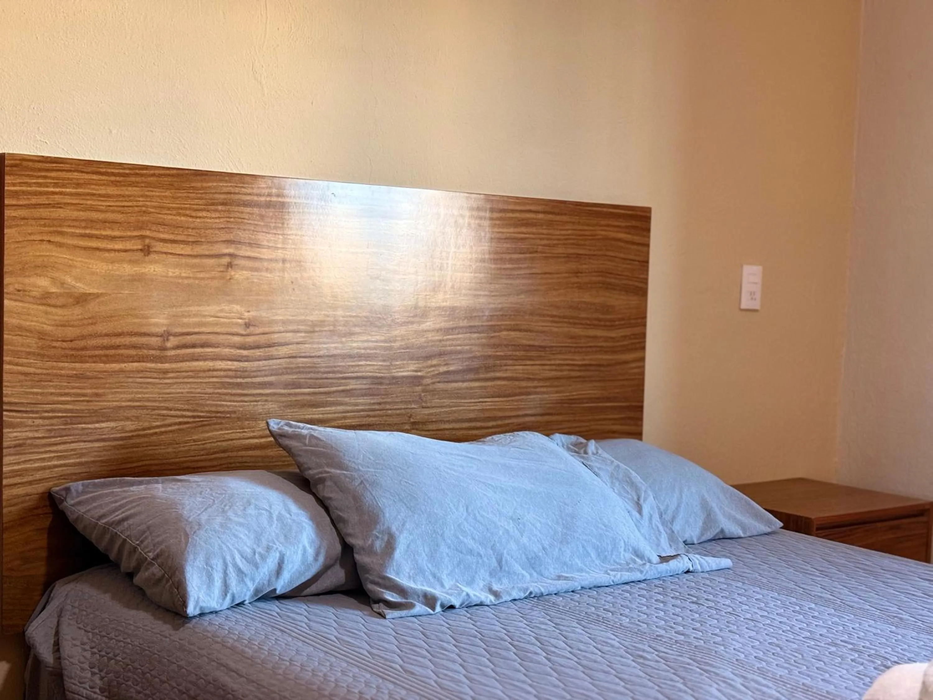 Bed in Departamentos Tequila