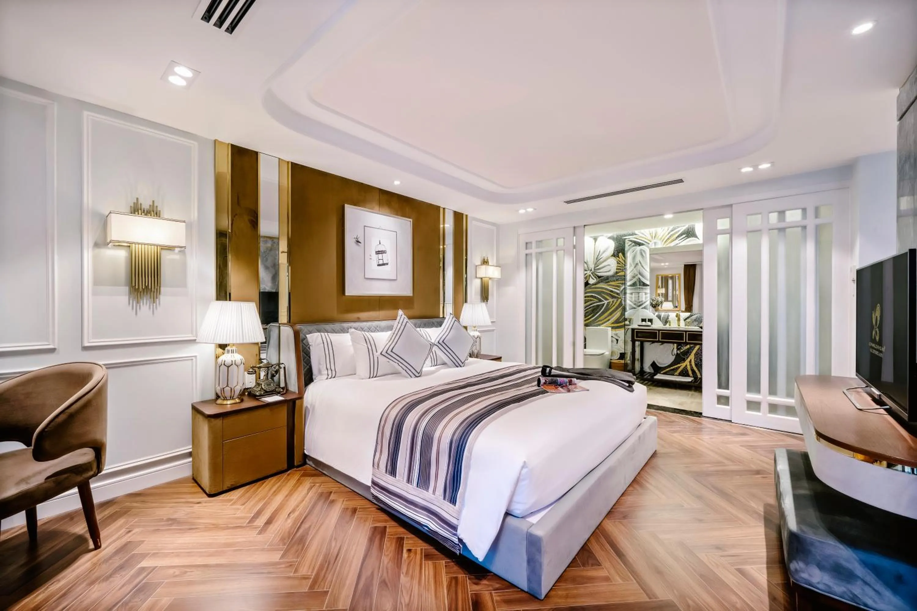 Bed in Le Pavillon Hoi An Gallery Hotel & Spa