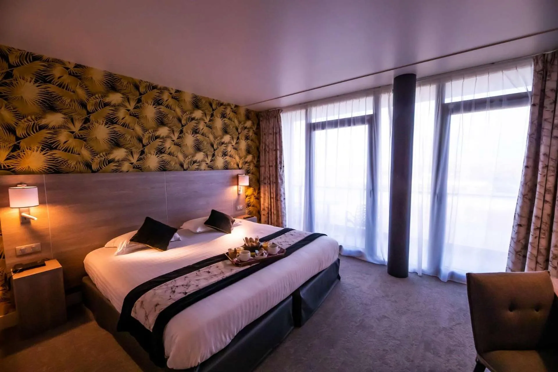 Bedroom, Bed in Brit Hotel Eden SPA Honfleur