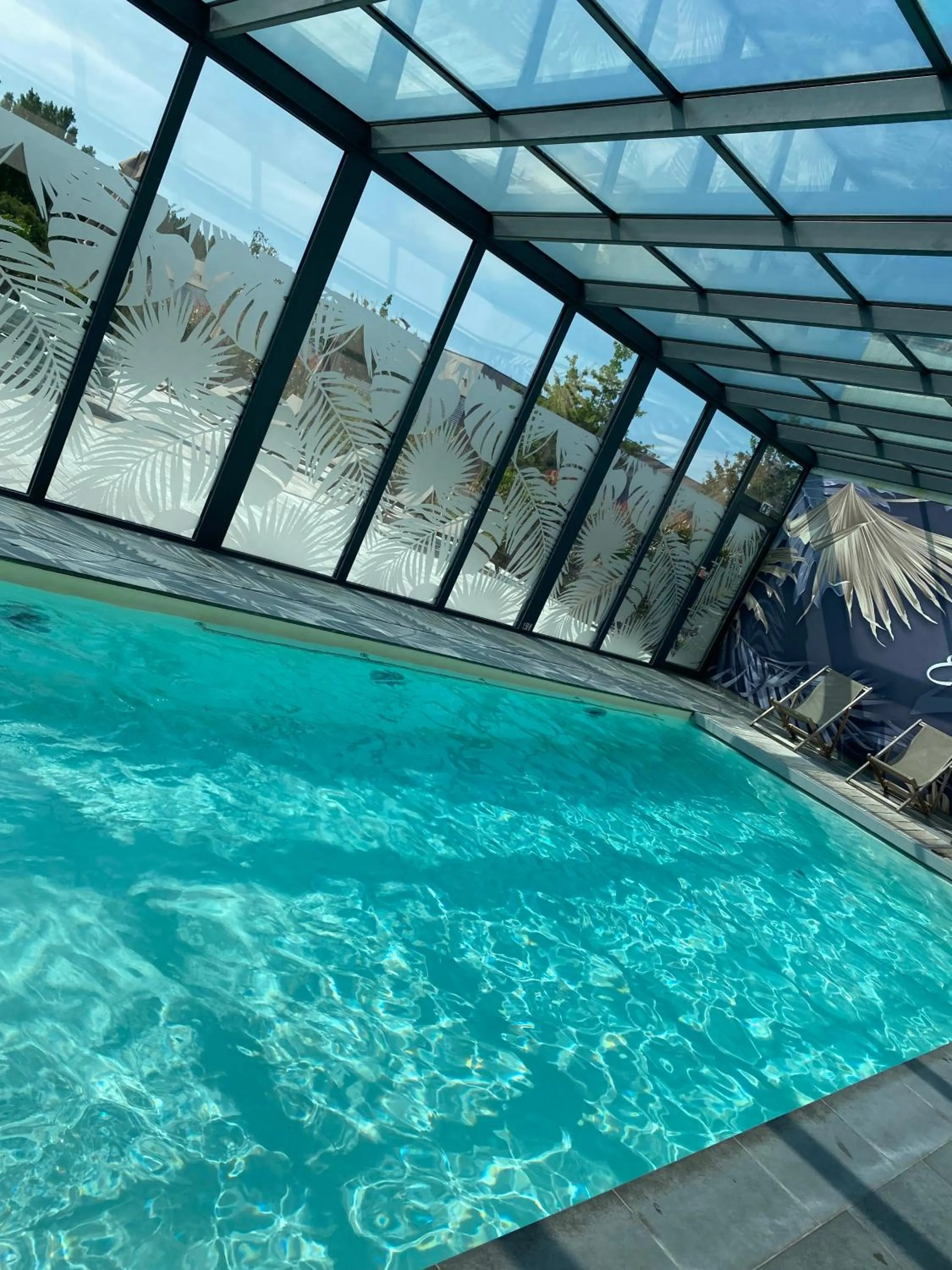 Swimming pool in Brit Hotel Eden SPA Honfleur