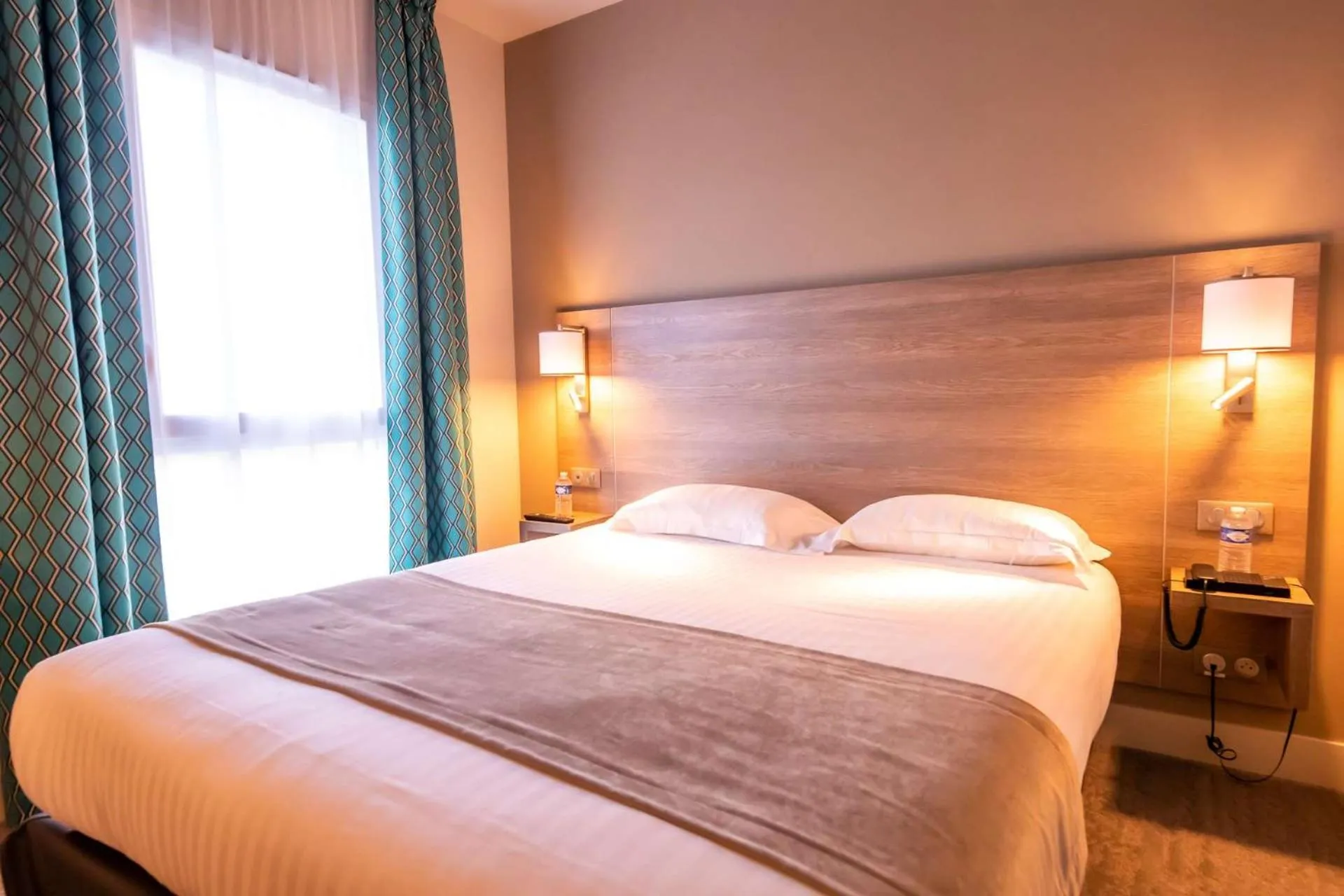 Bedroom, Bed in Brit Hotel Eden SPA Honfleur