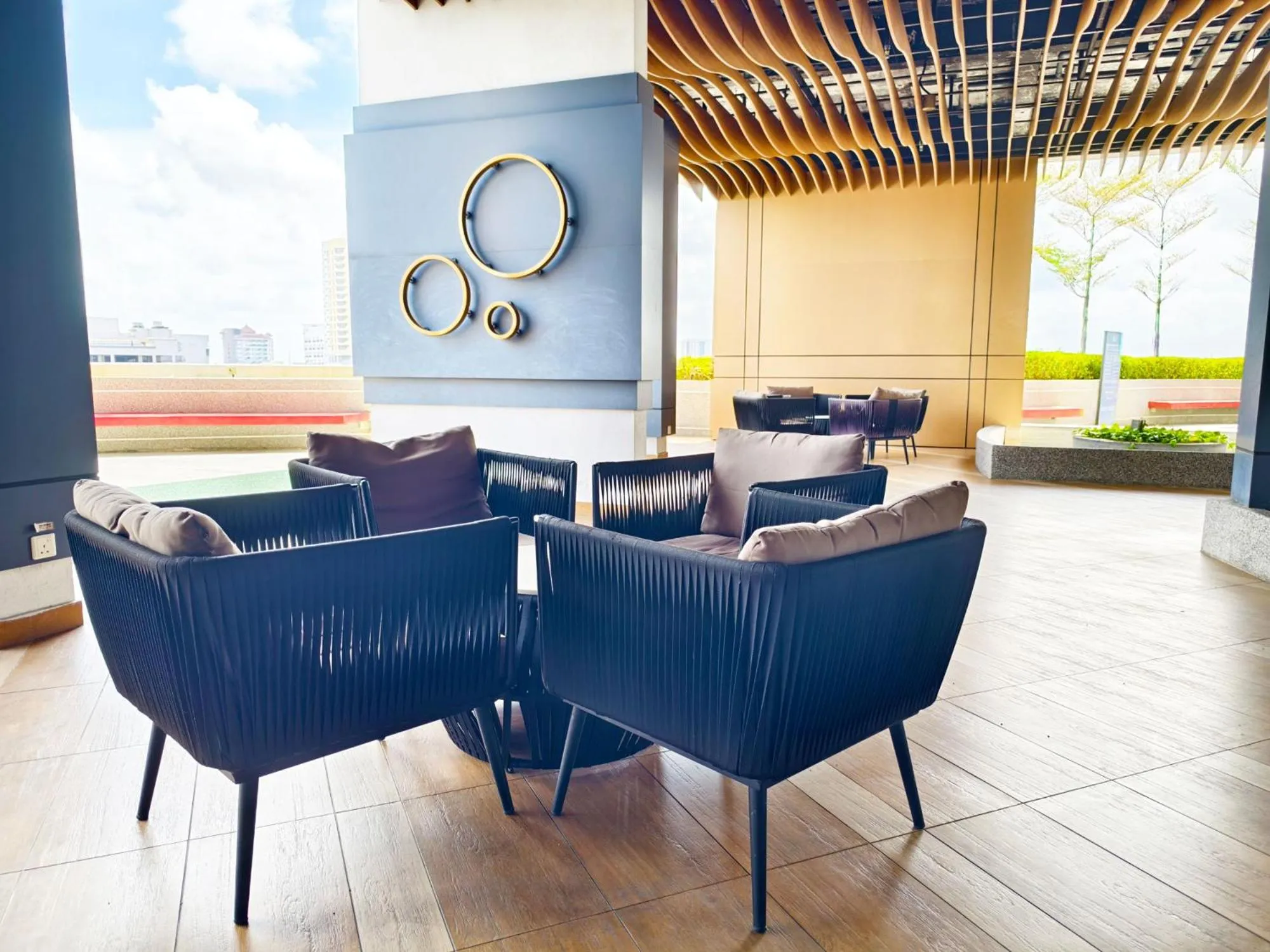 Seating area in Troika Kota Bharu by Salaam Suites