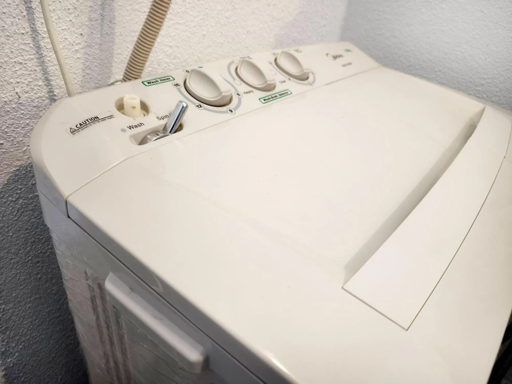 washing machine in Troika Kota Bharu by Salaam Suites