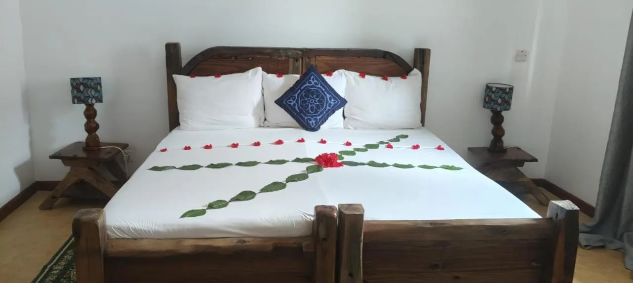 Bed in Kibanda Natural Kendwa Villa