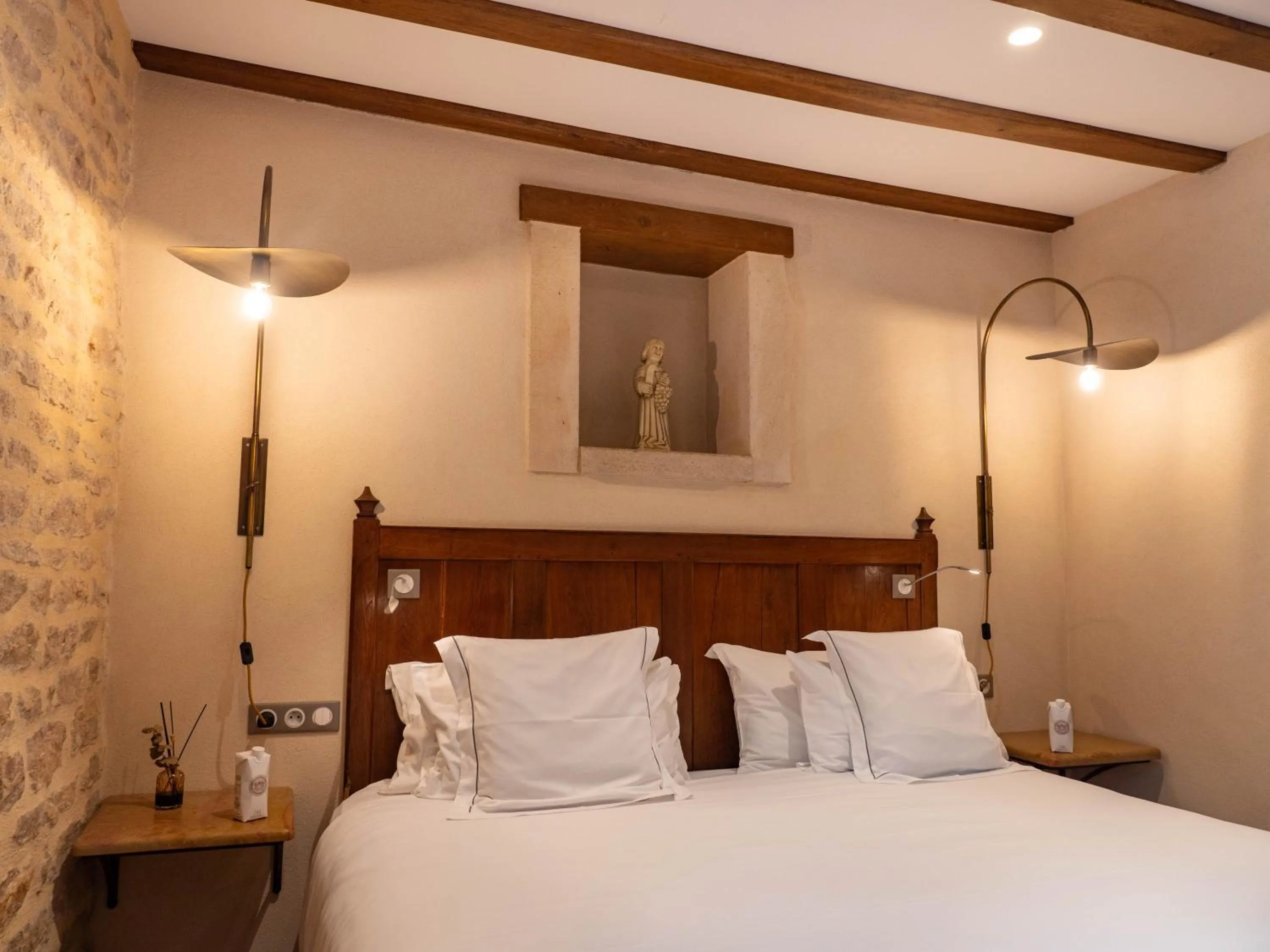 Bed in Les Remparts Hôtels et Demeures Historiques