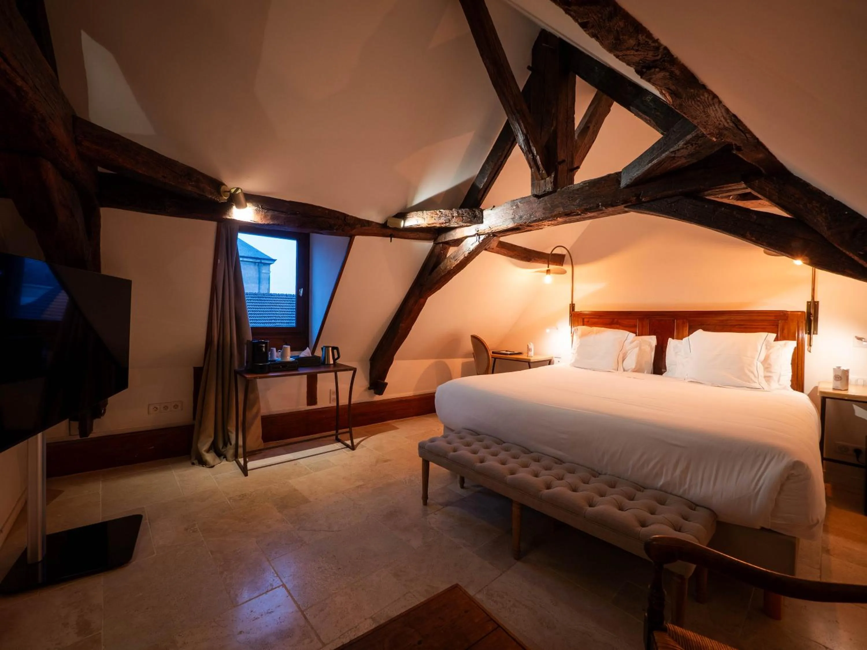 Bed in Les Remparts Hôtels et Demeures Historiques