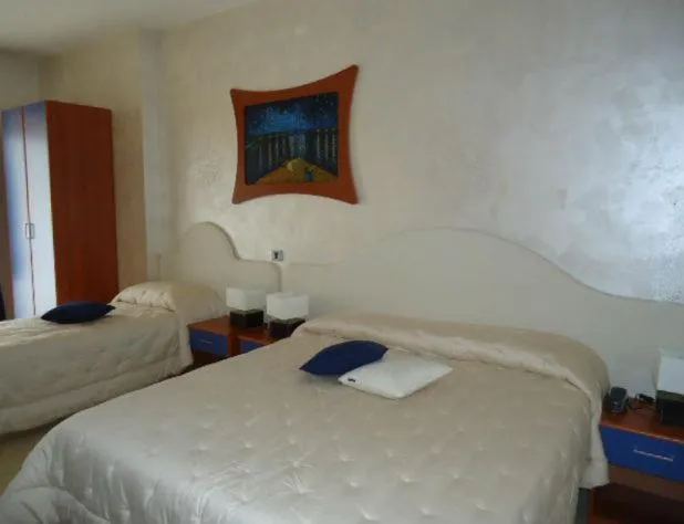 Bed in Tea Palace Hotel