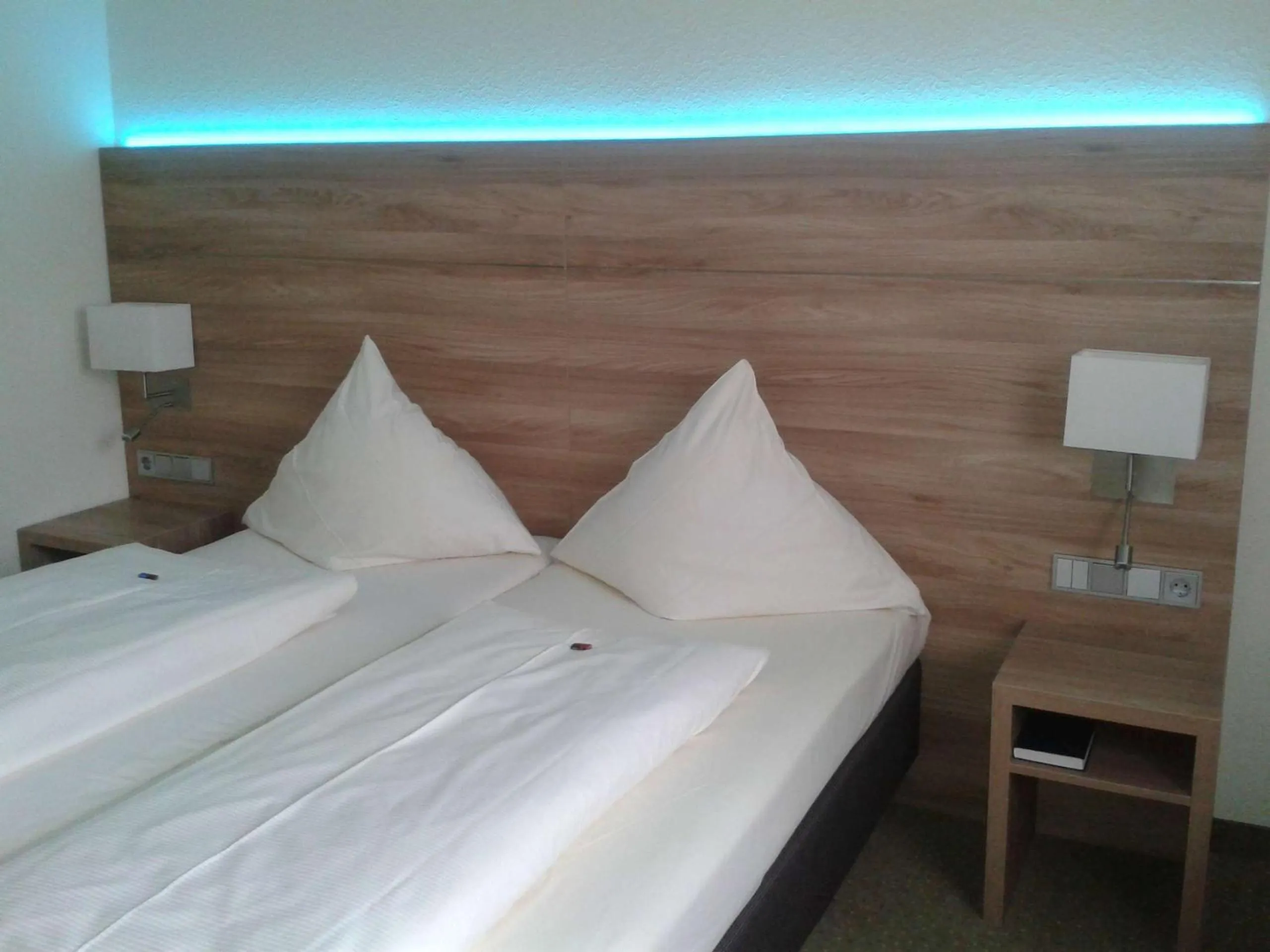 Bed in Hotel Jedermann