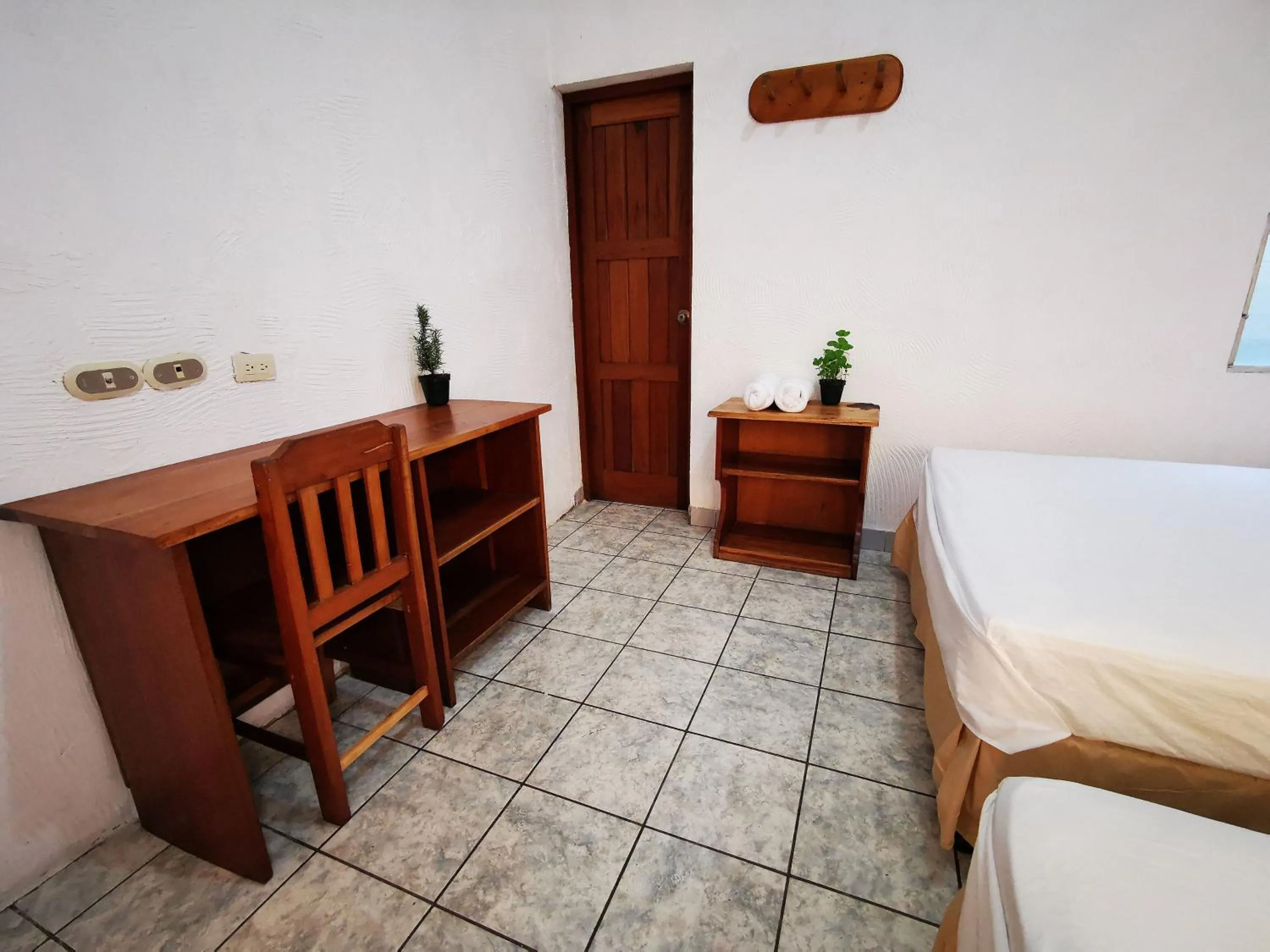 Seating area, Bed in Natz Hotel