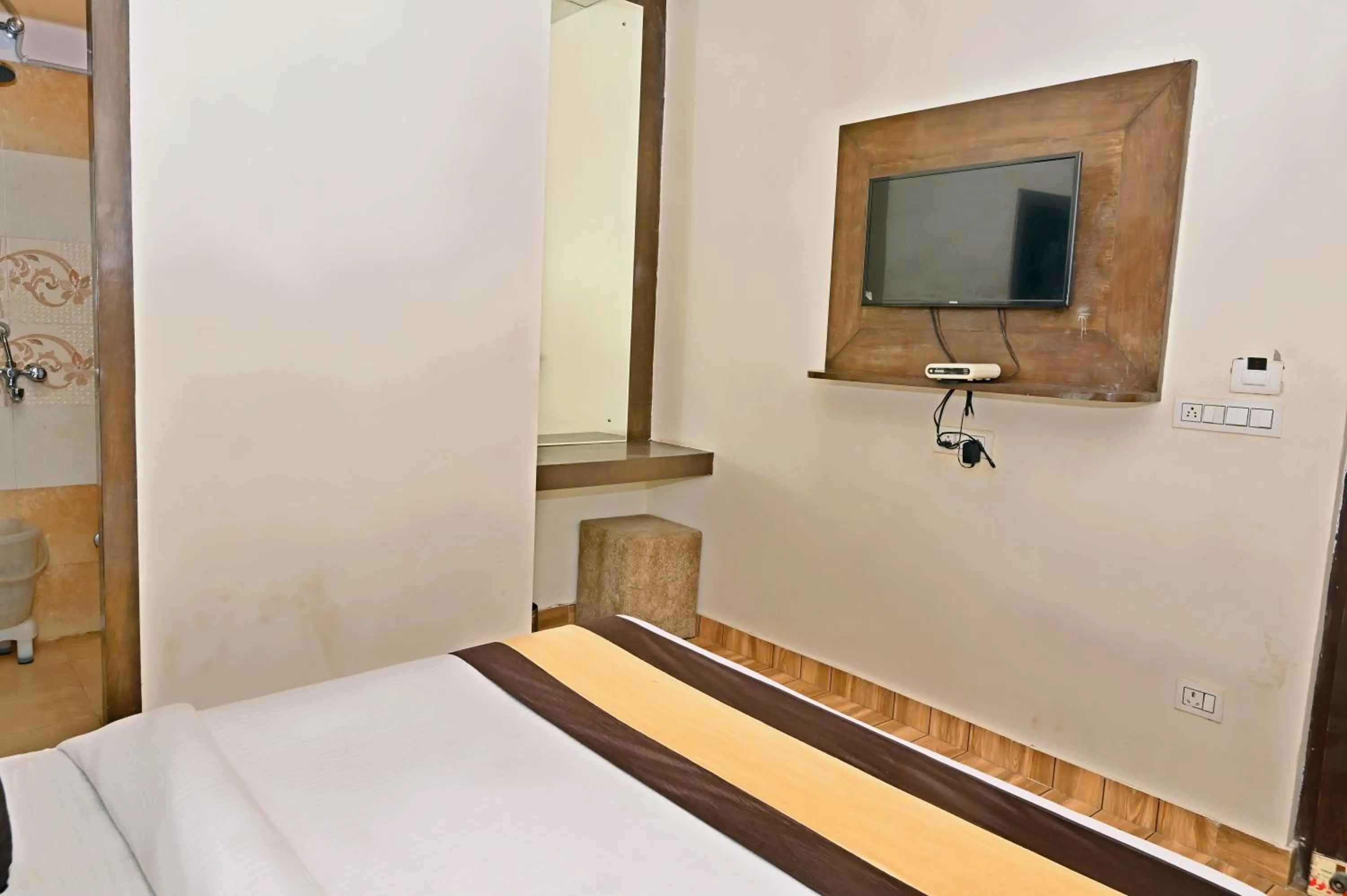 Bed in TRPOTELS Sudarshan