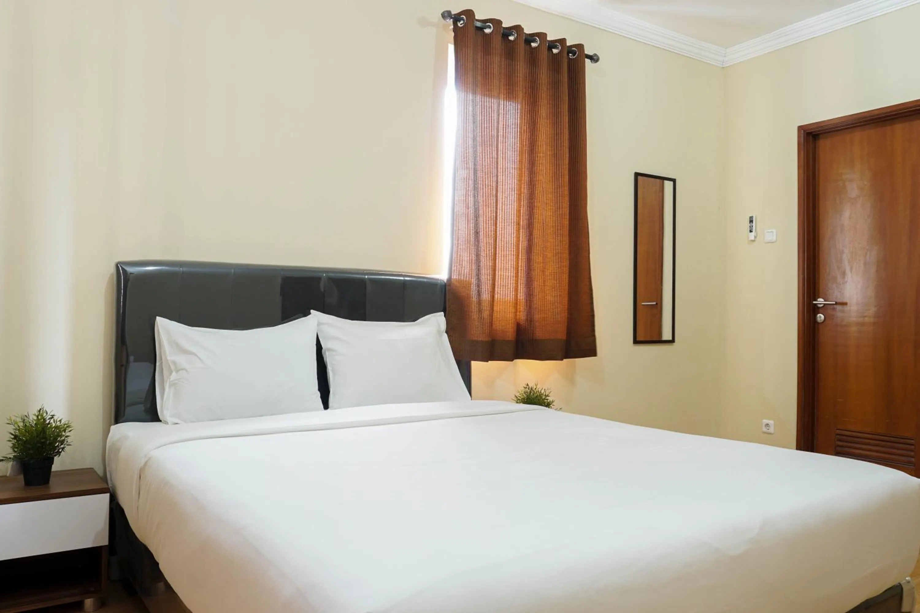 Bed in Spacious 3BR Residence at Grand Palace Kemayoran Apartment By Travelio