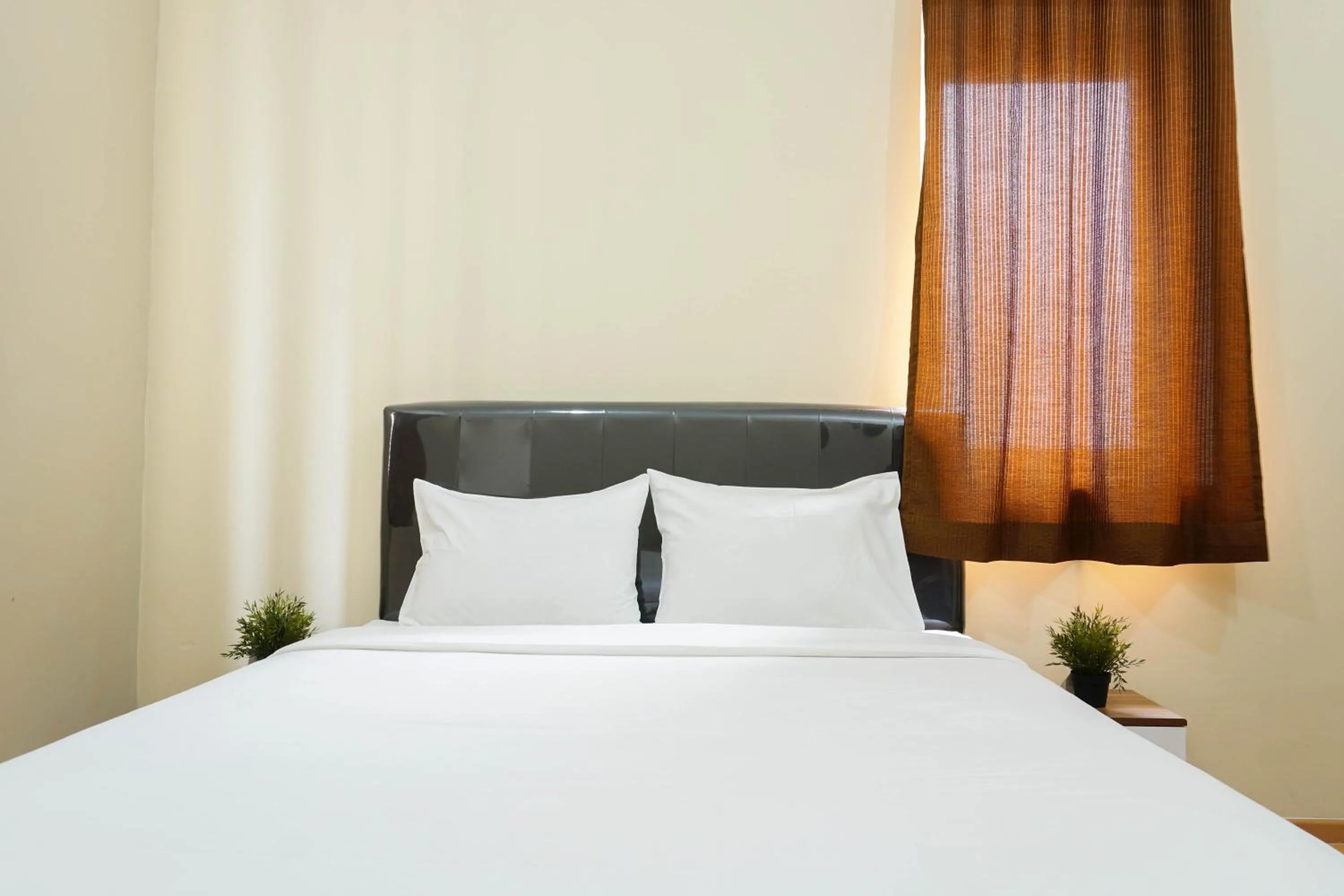 Bed in Spacious 3BR Residence at Grand Palace Kemayoran Apartment By Travelio