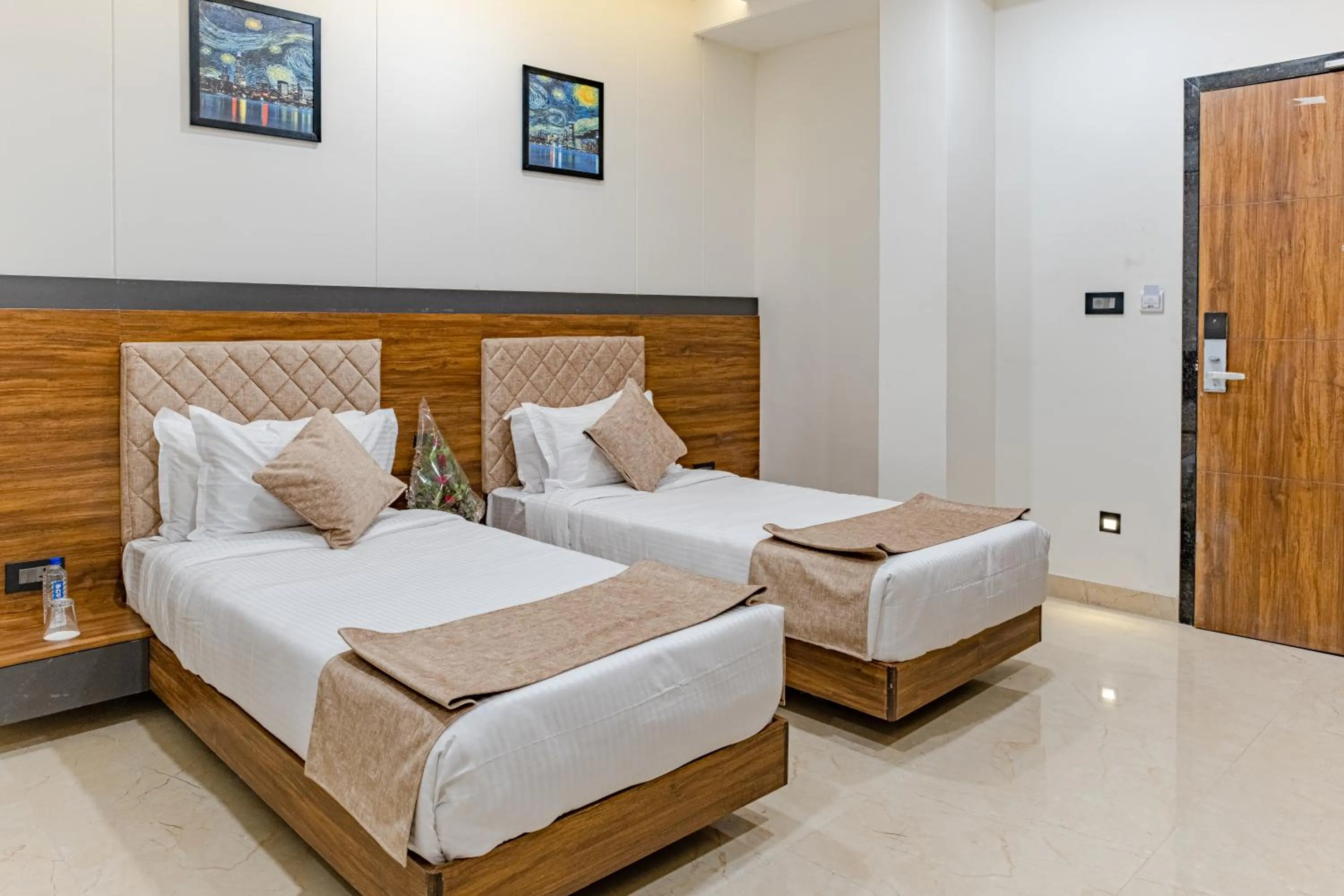 Bed in Suvin Residency with Rooftop Swimming Pool