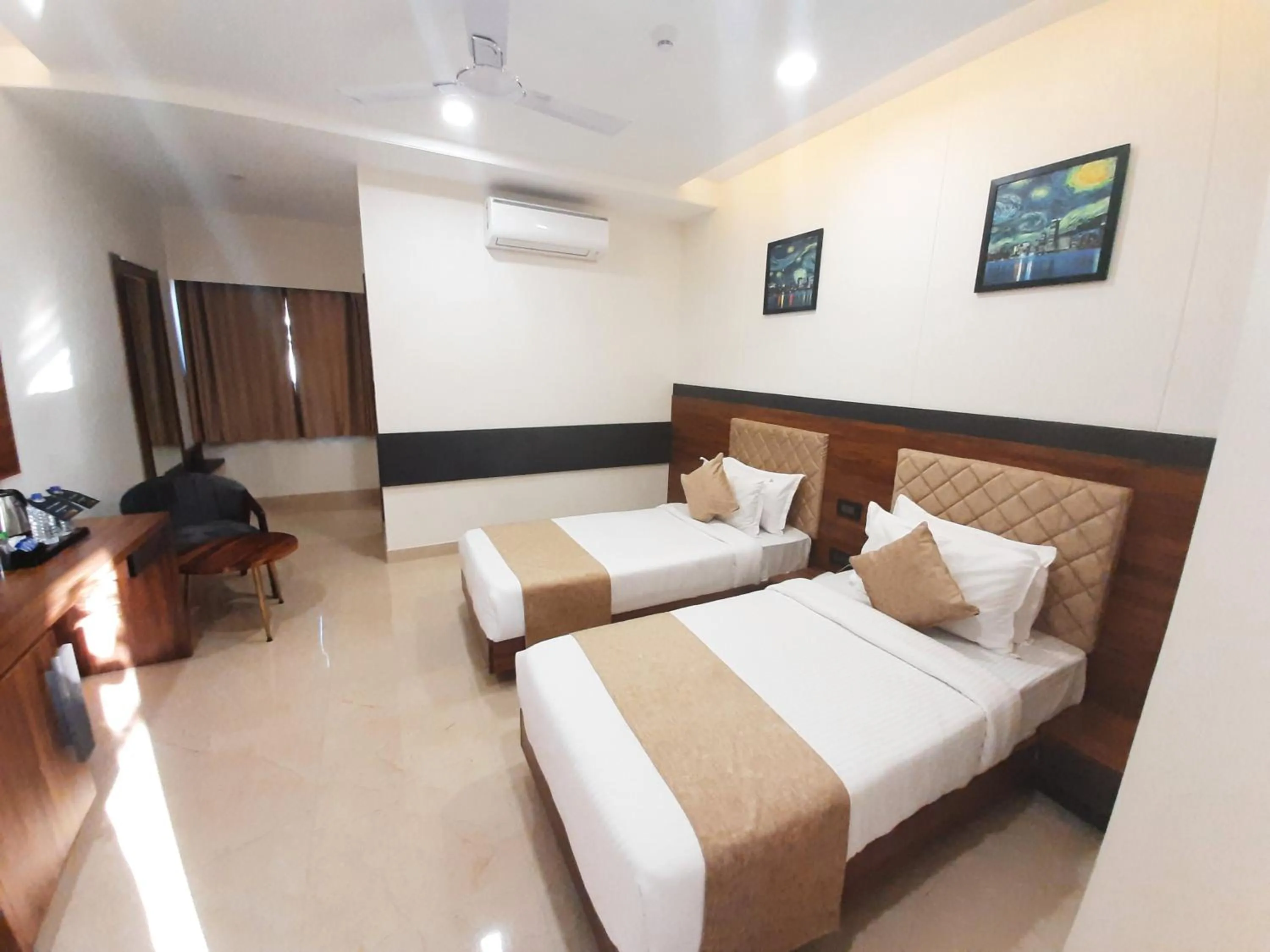 Bed in Suvin Residency with Rooftop Swimming Pool