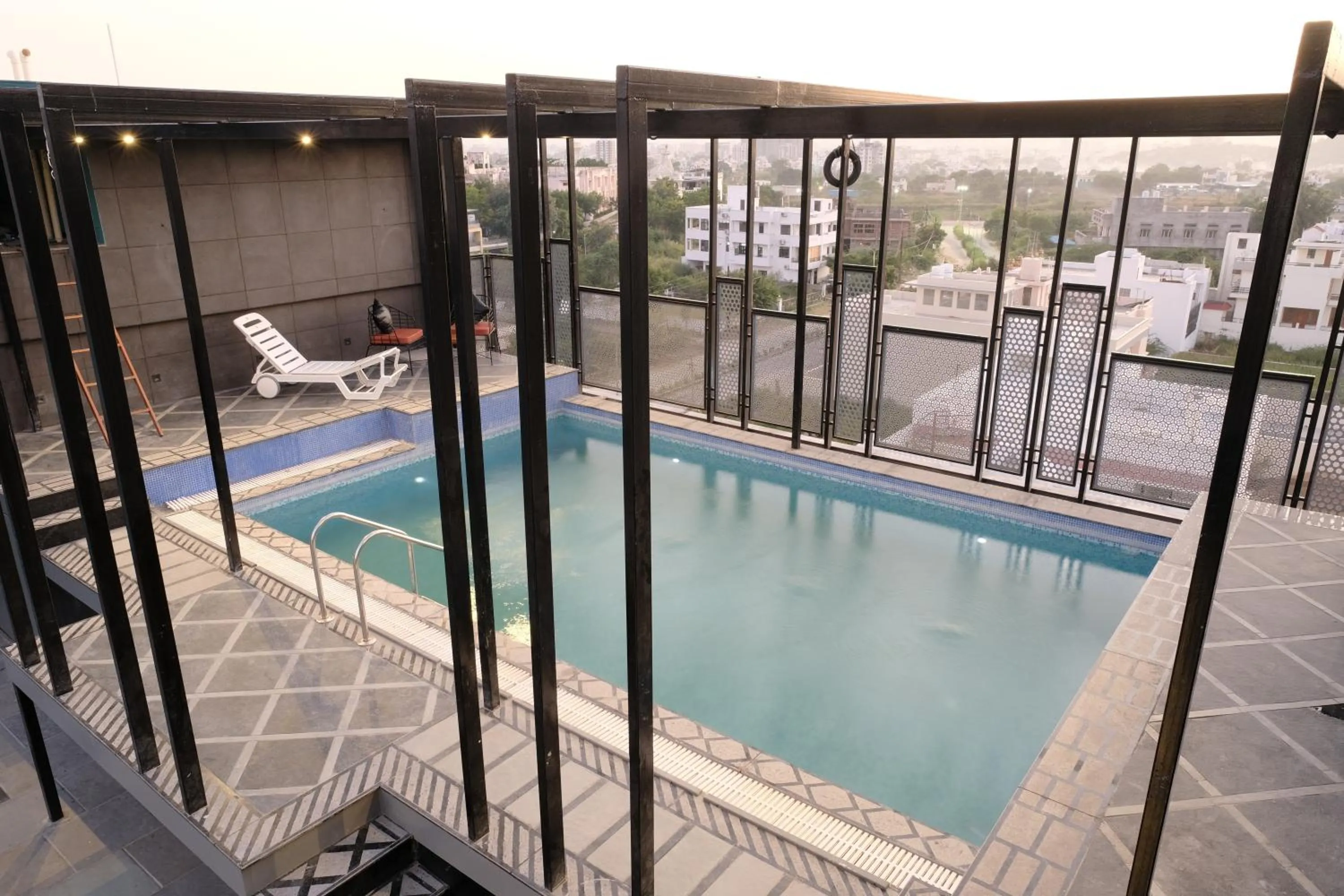 Patio in Suvin Residency with Rooftop Swimming Pool