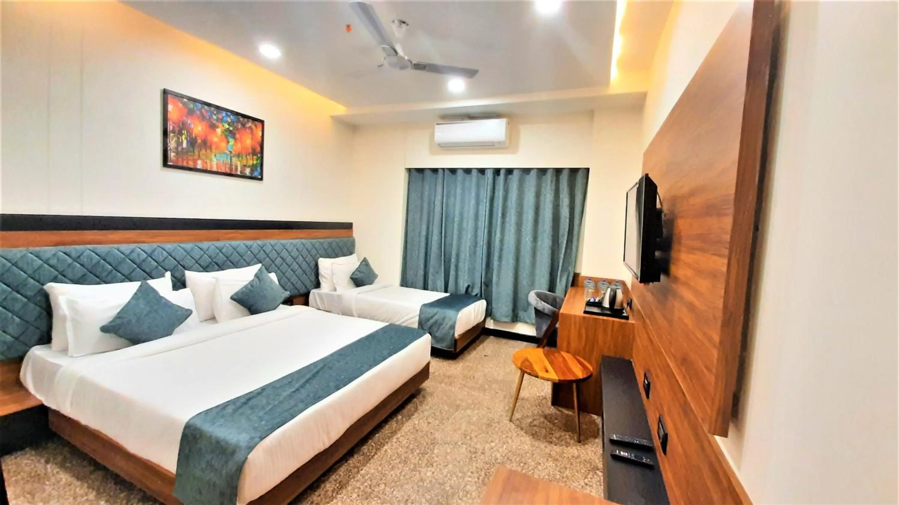 Bed in Suvin Residency with Rooftop Swimming Pool