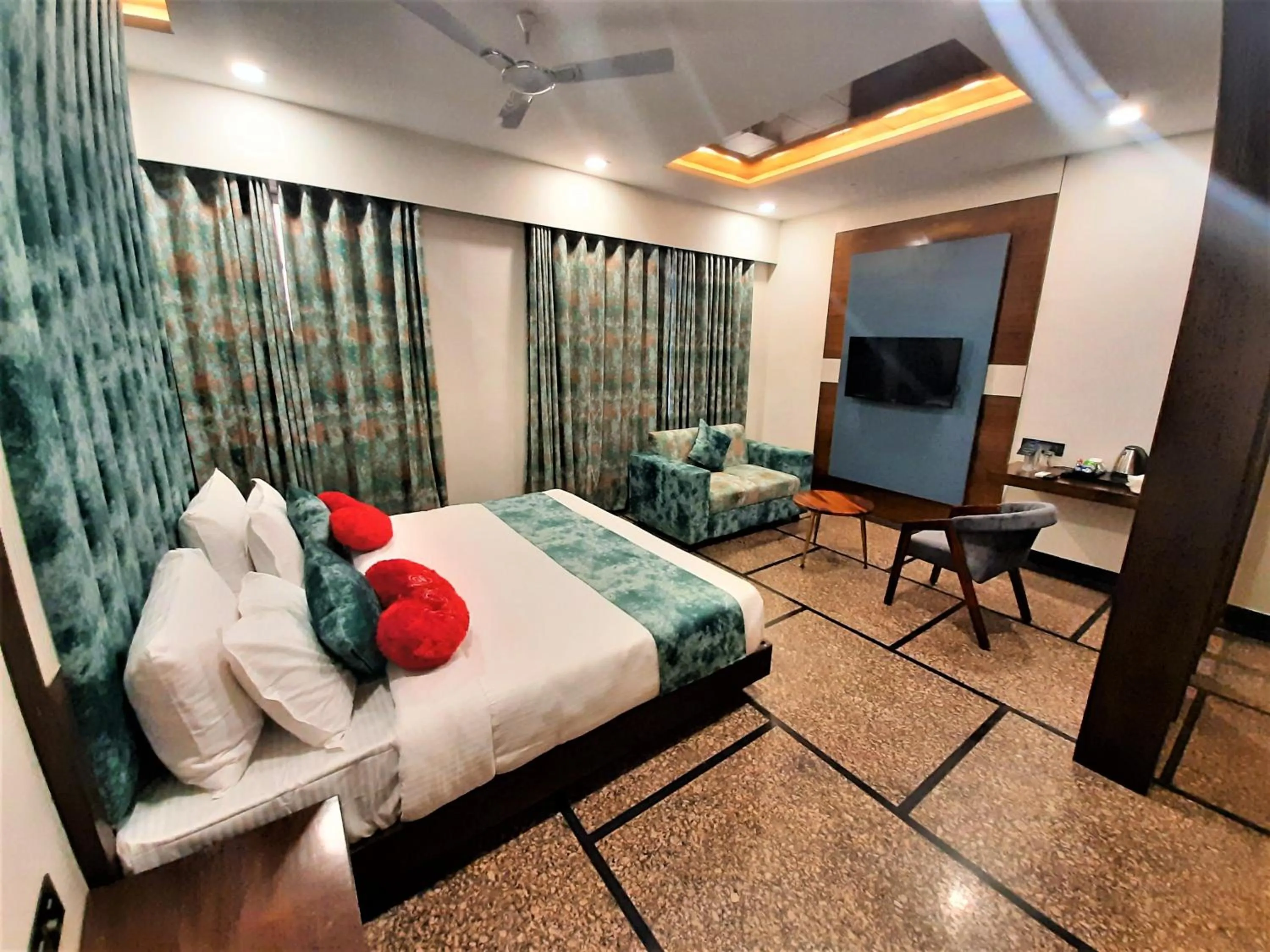 Bed in Suvin Residency with Rooftop Swimming Pool