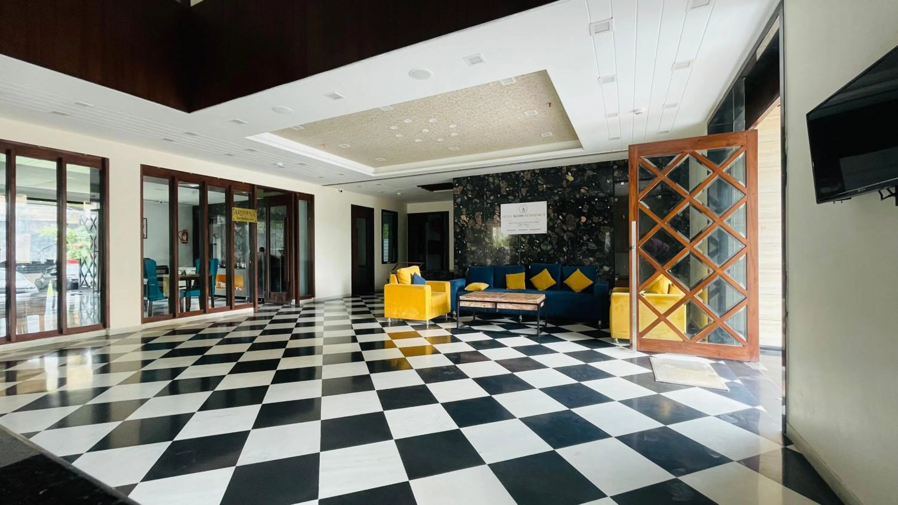 Lobby or reception in Suvin Residency with Rooftop Swimming Pool