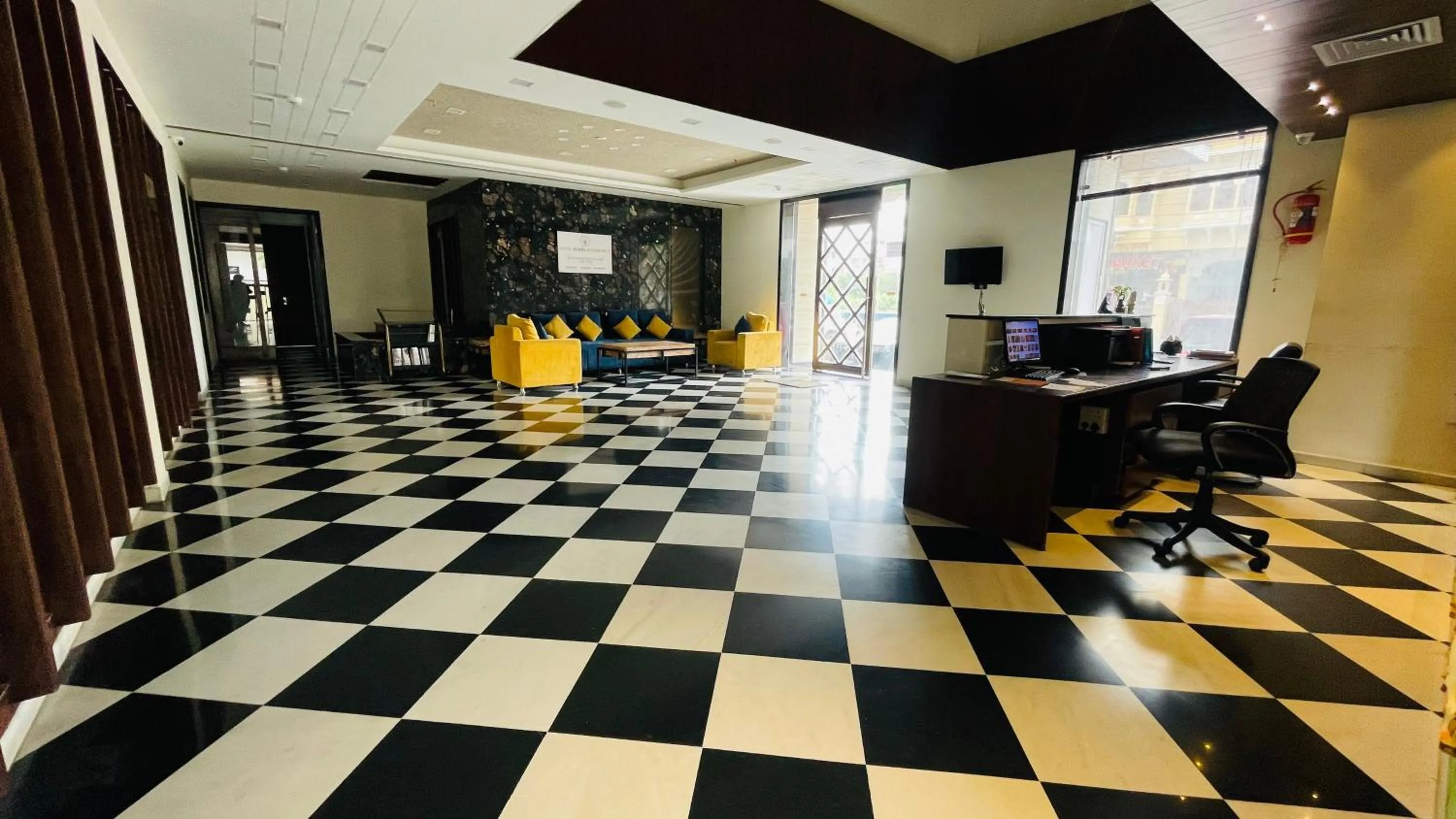 Lobby or reception in Suvin Residency with Rooftop Swimming Pool