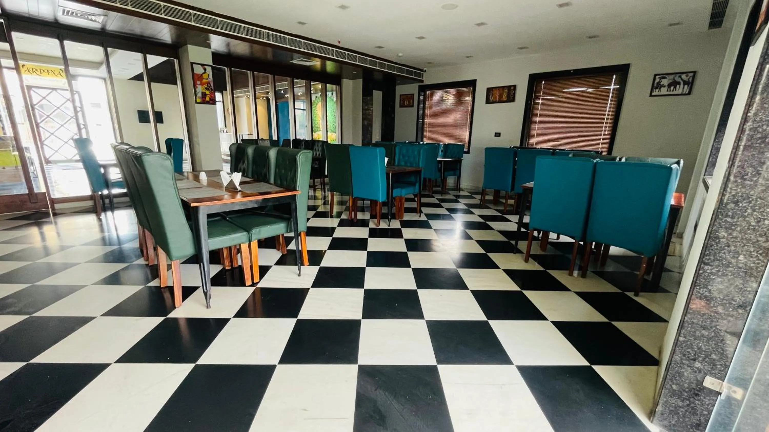 Restaurant/places to eat in Suvin Residency with Rooftop Swimming Pool