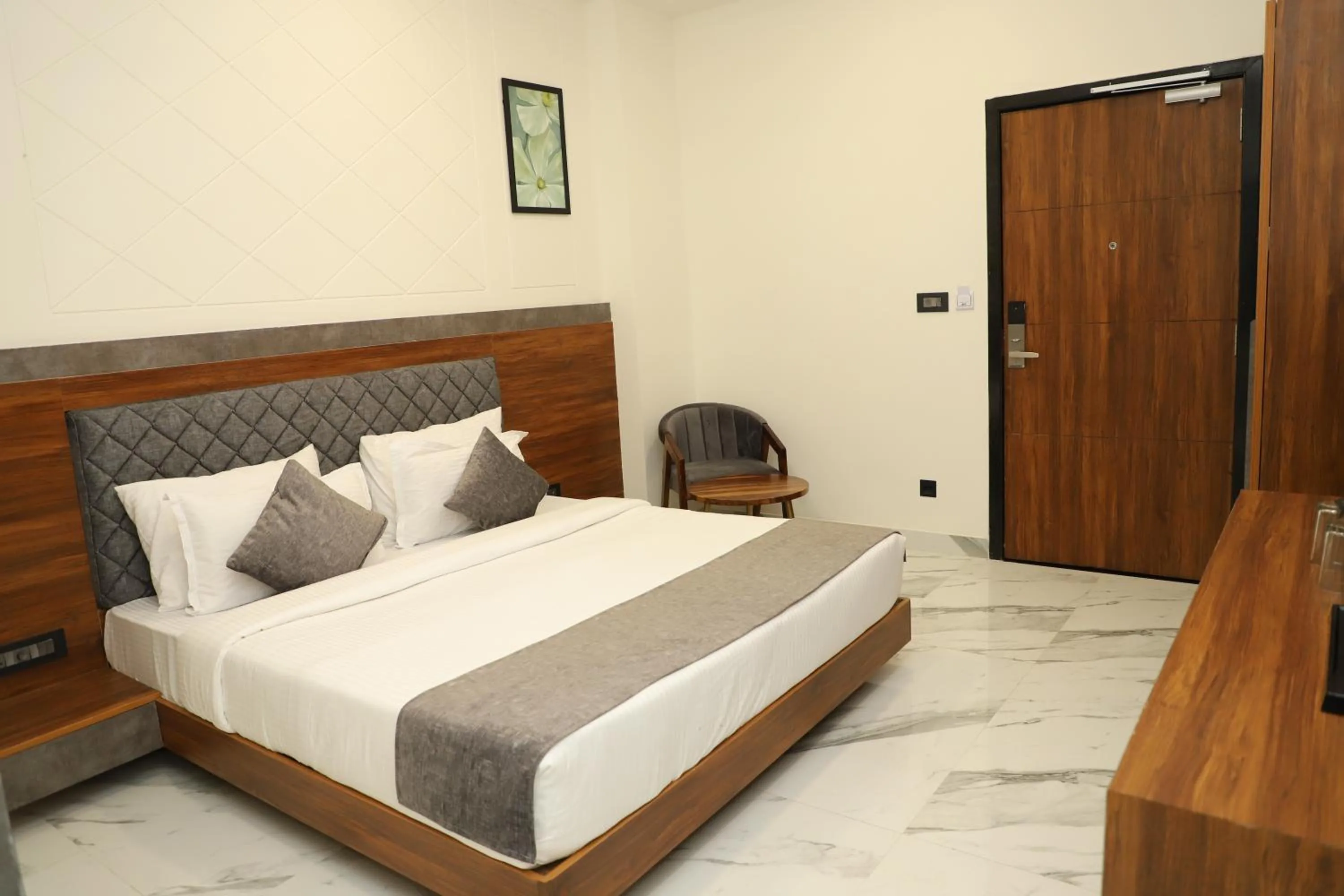 Bed in Suvin Residency with Rooftop Swimming Pool