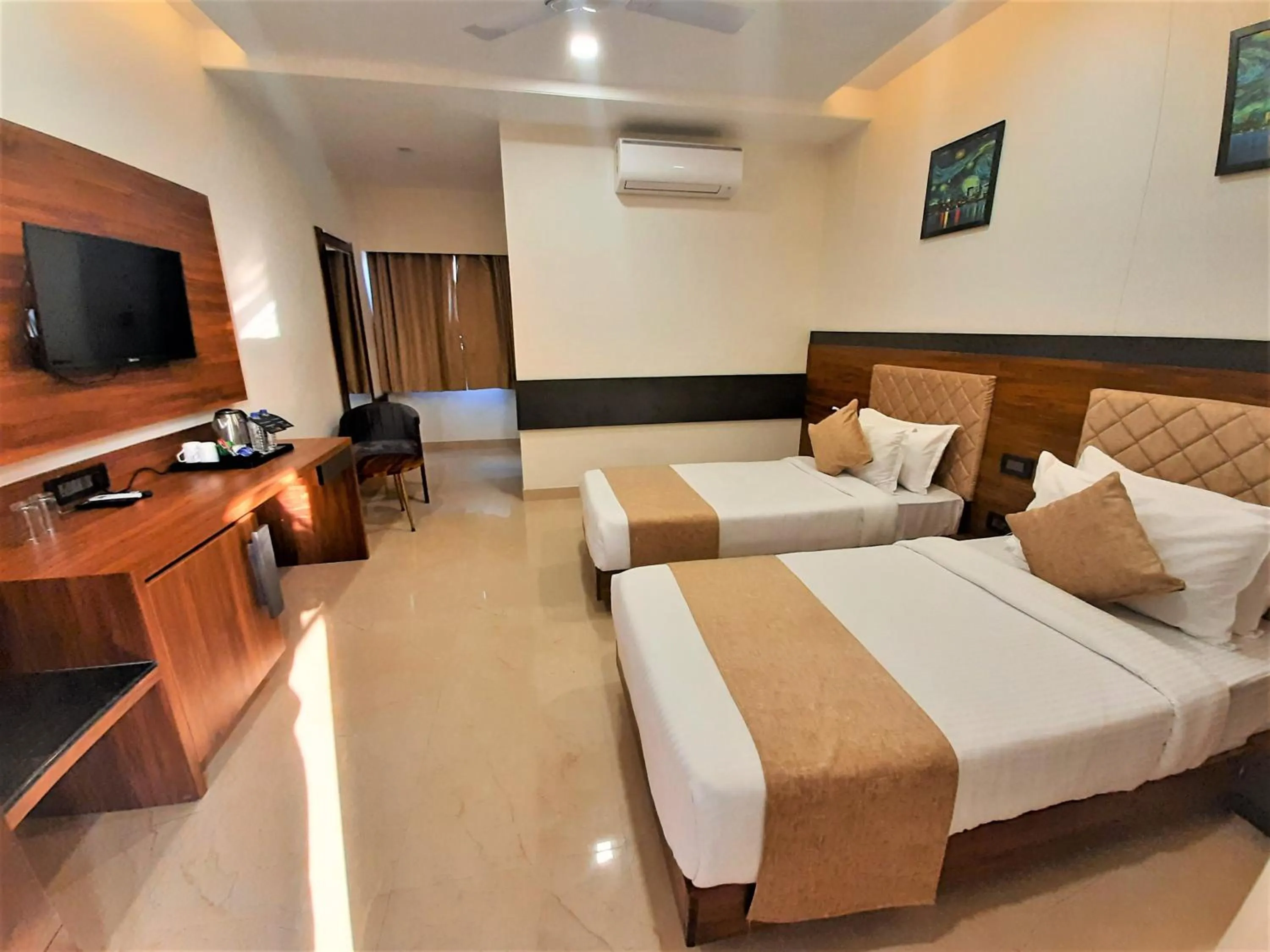 Bed in Suvin Residency with Rooftop Swimming Pool