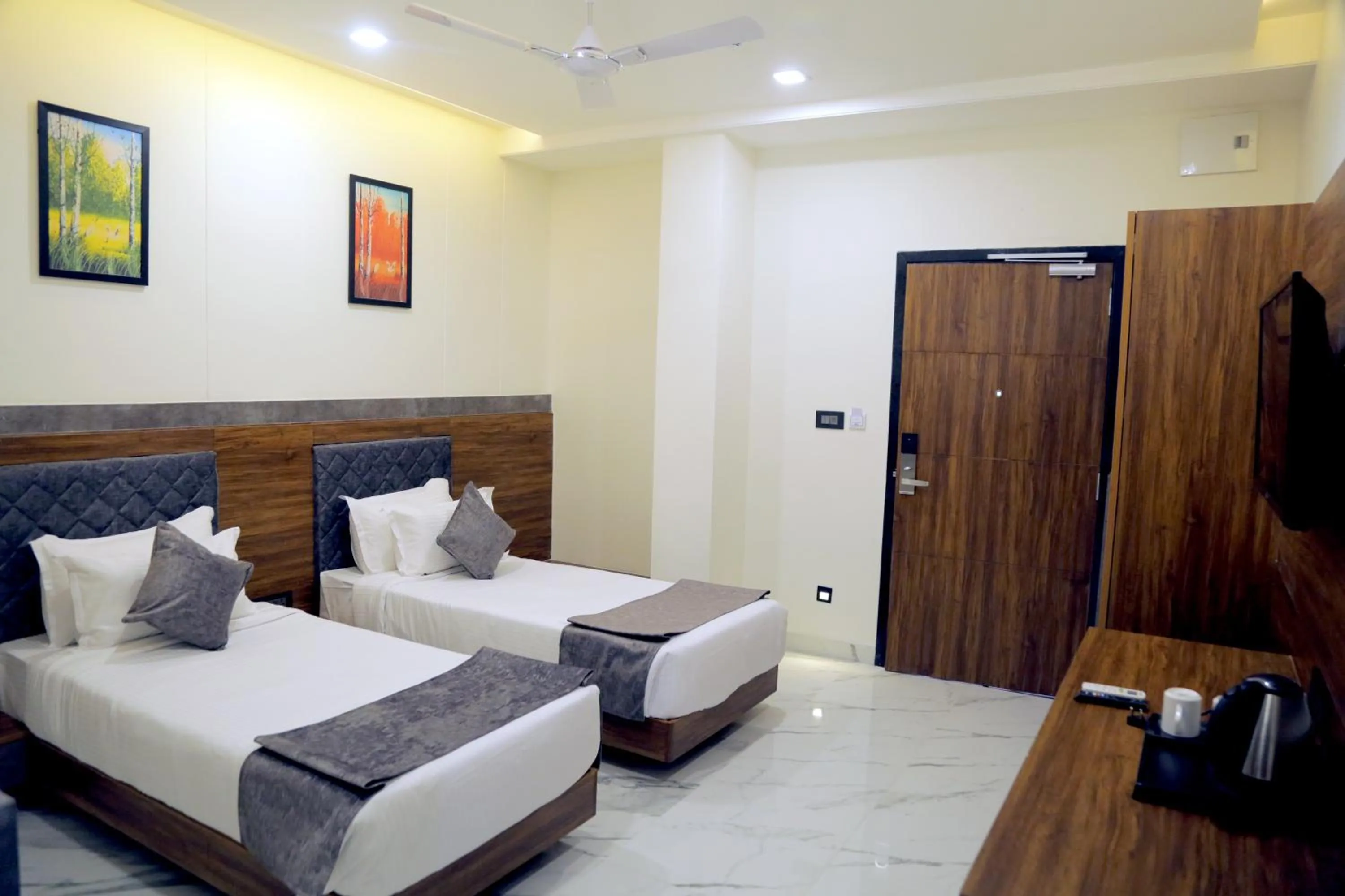 Bed in Suvin Residency with Rooftop Swimming Pool