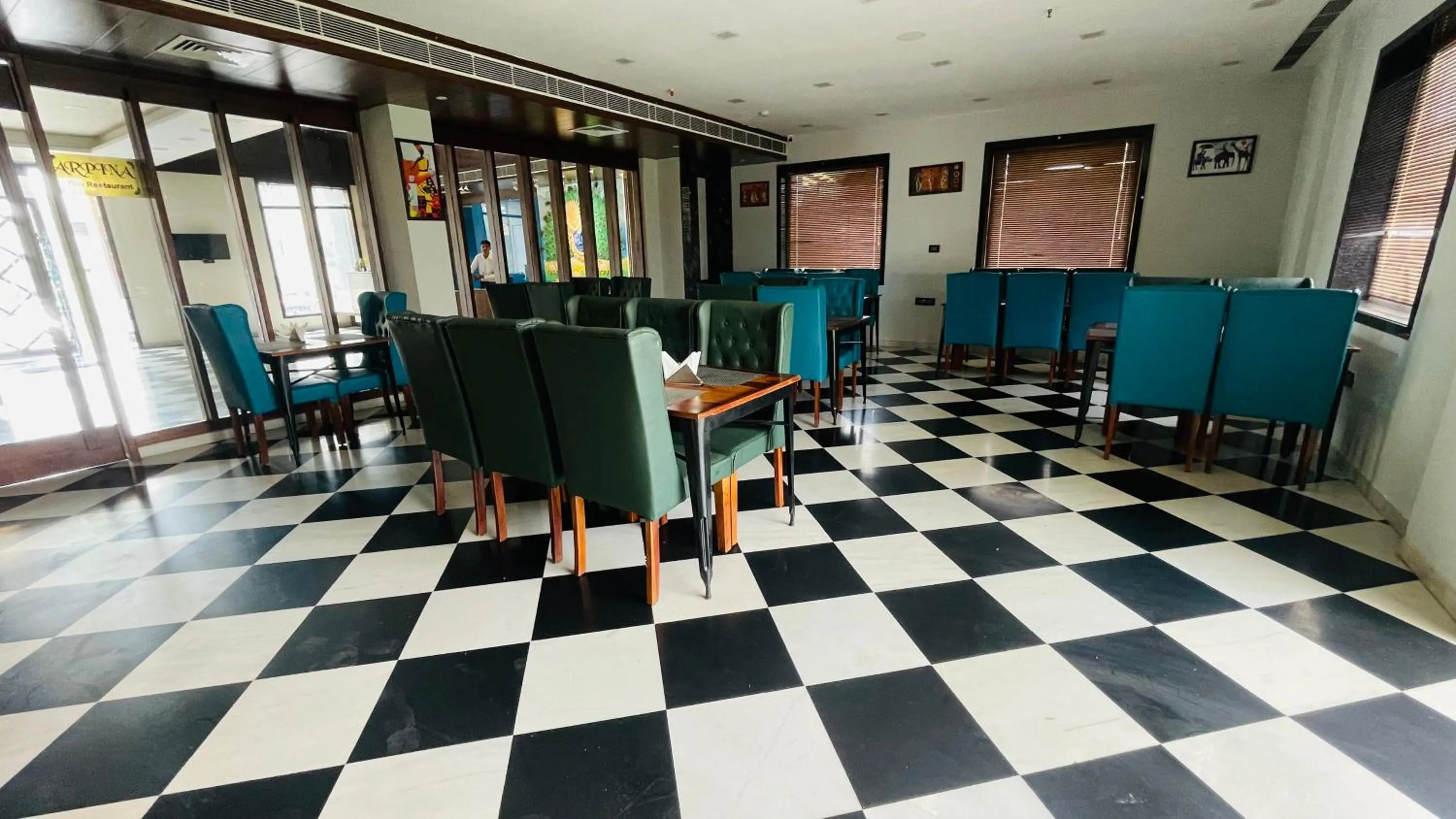 Restaurant/places to eat in Suvin Residency with Rooftop Swimming Pool