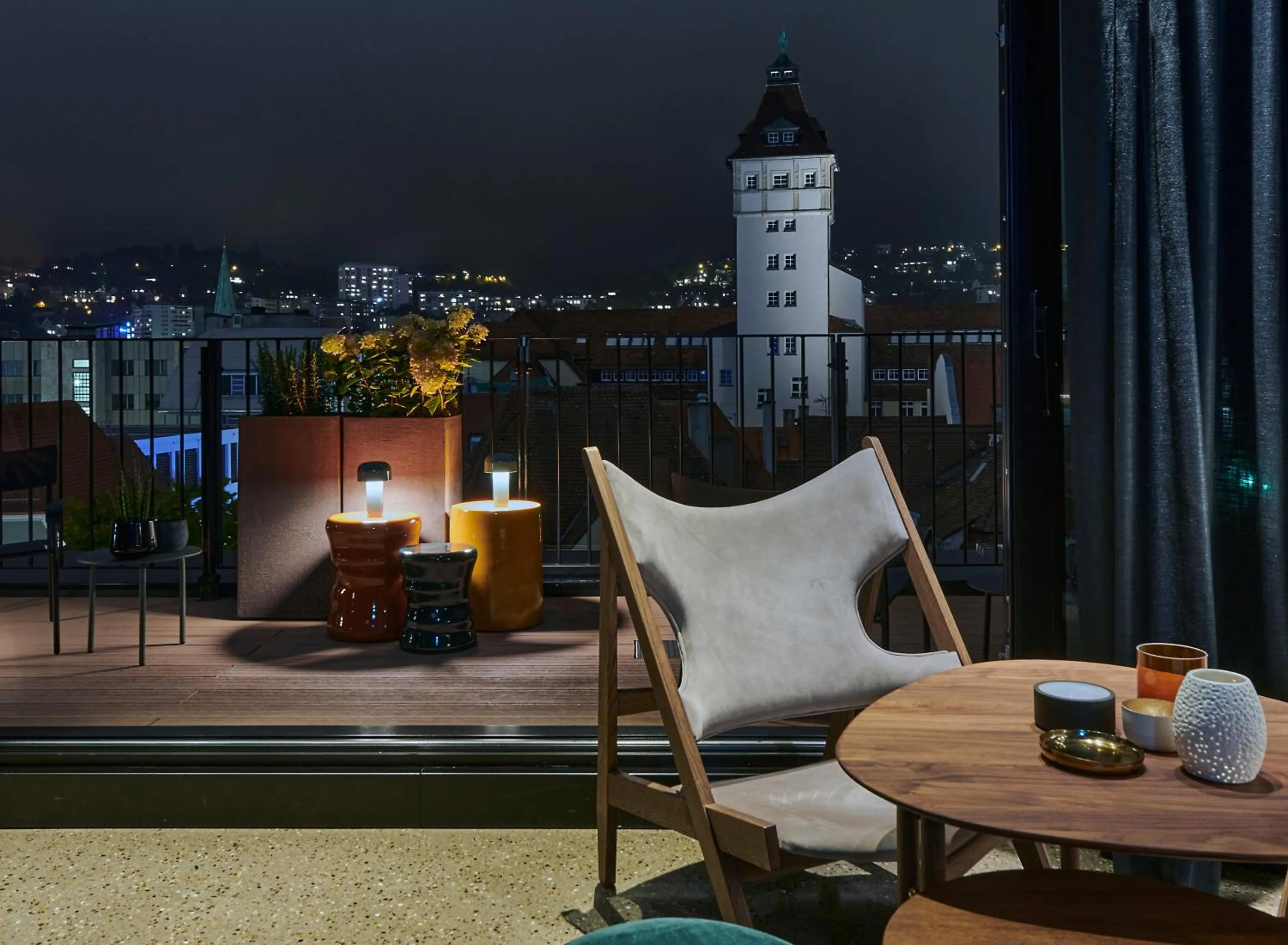 Communal lounge/ TV room in EmiLu Design Hotel