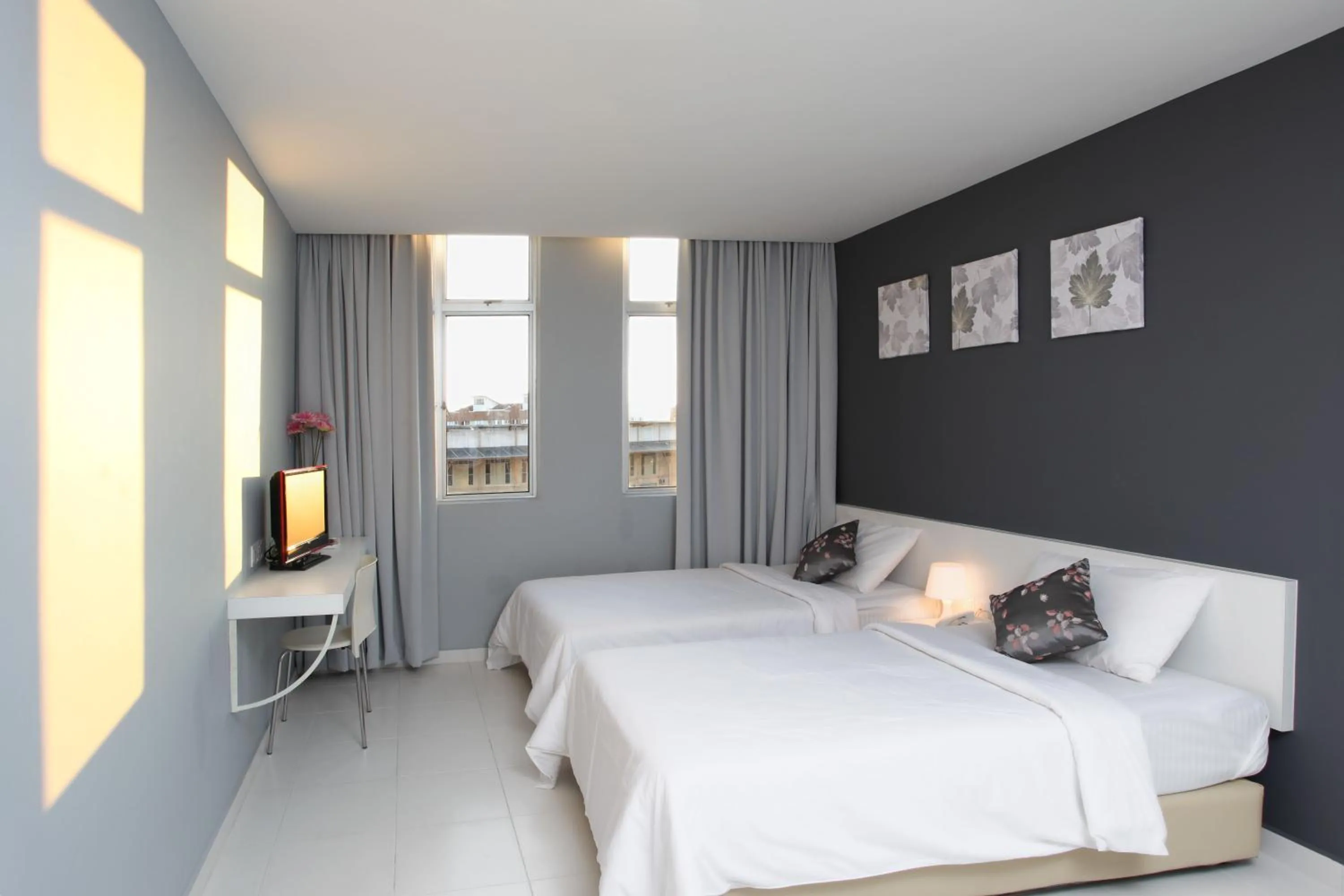 Bed in Wan Loong Hotel