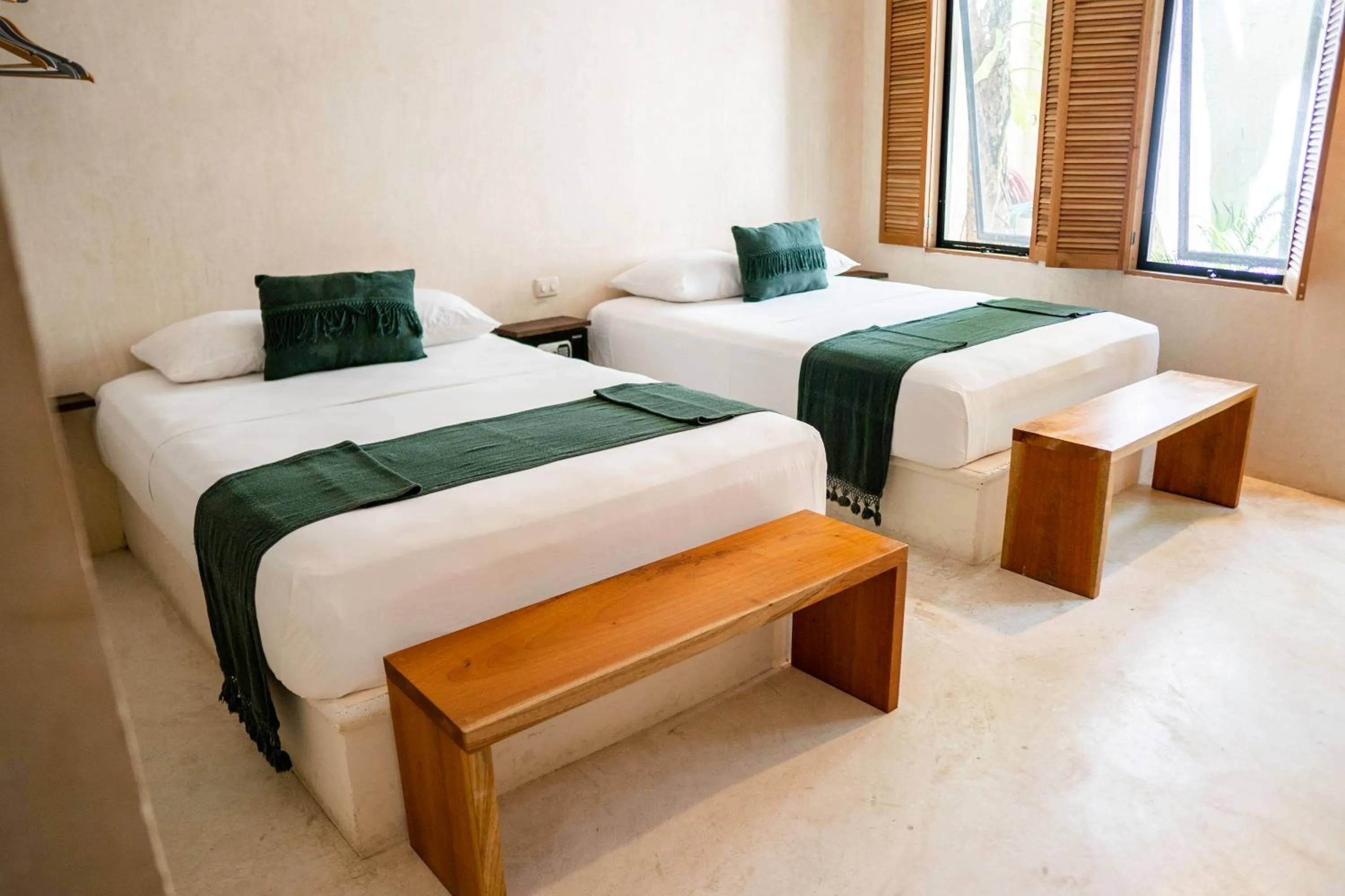 Photo of the whole room, Bed in Koos Tulum Hotel