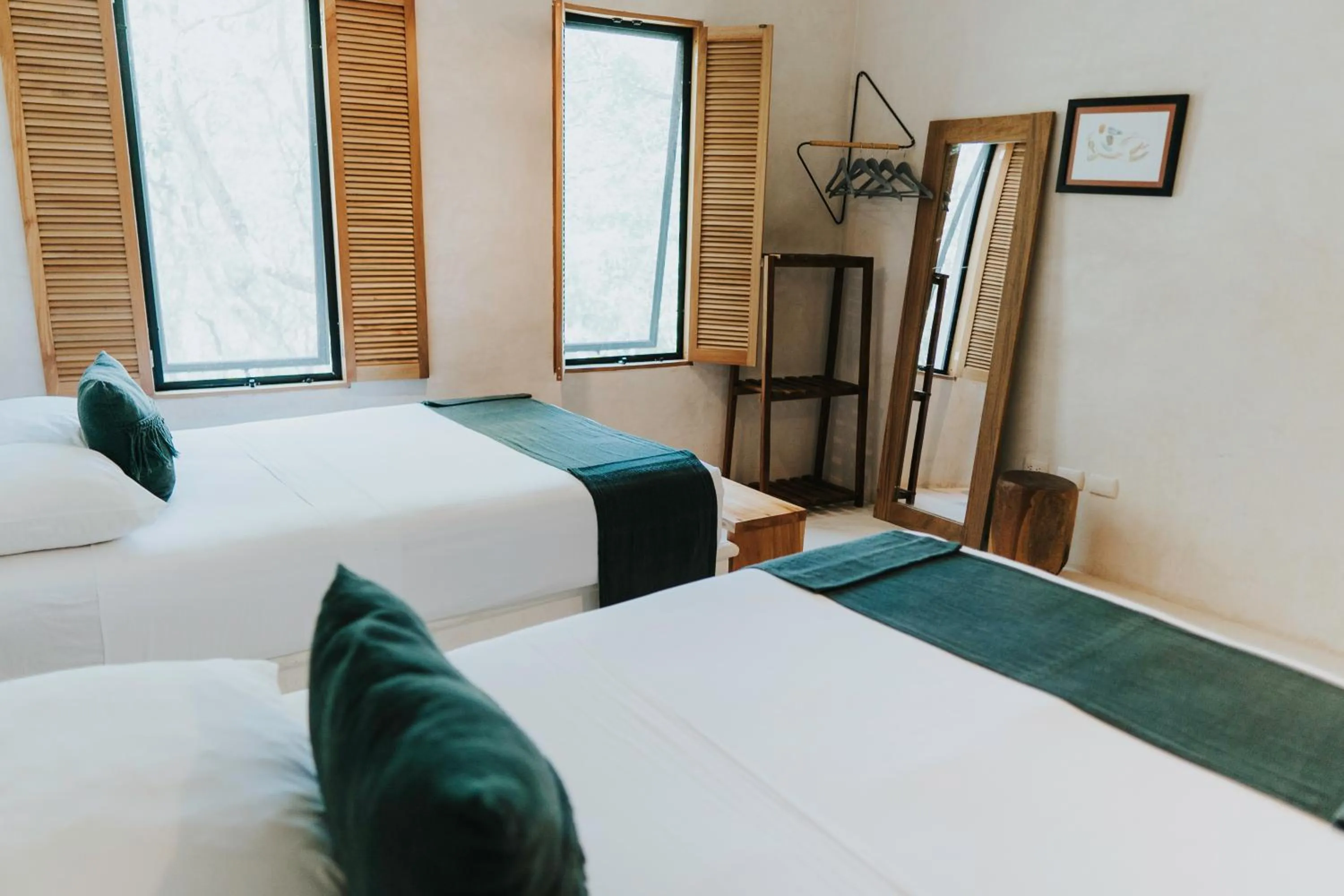 Bed in Koos Tulum Hotel