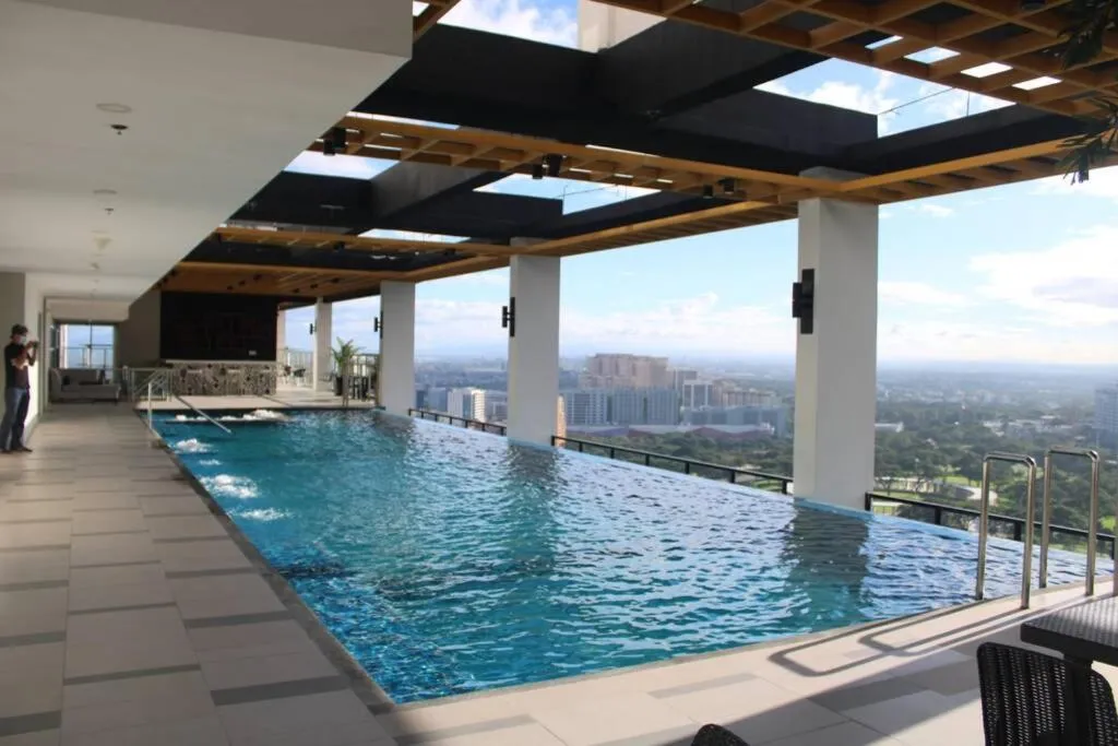 Swimming pool in A2J Luxury BGC Balcony Suite Near SM AURA Taguig
