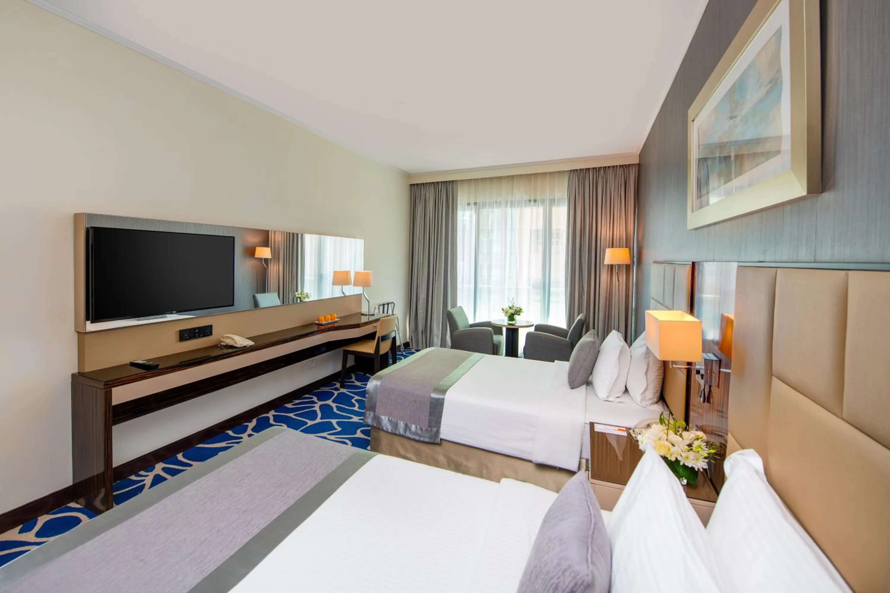 Bed in Hawthorn Suites by Wyndham Abu Dhabi City Center