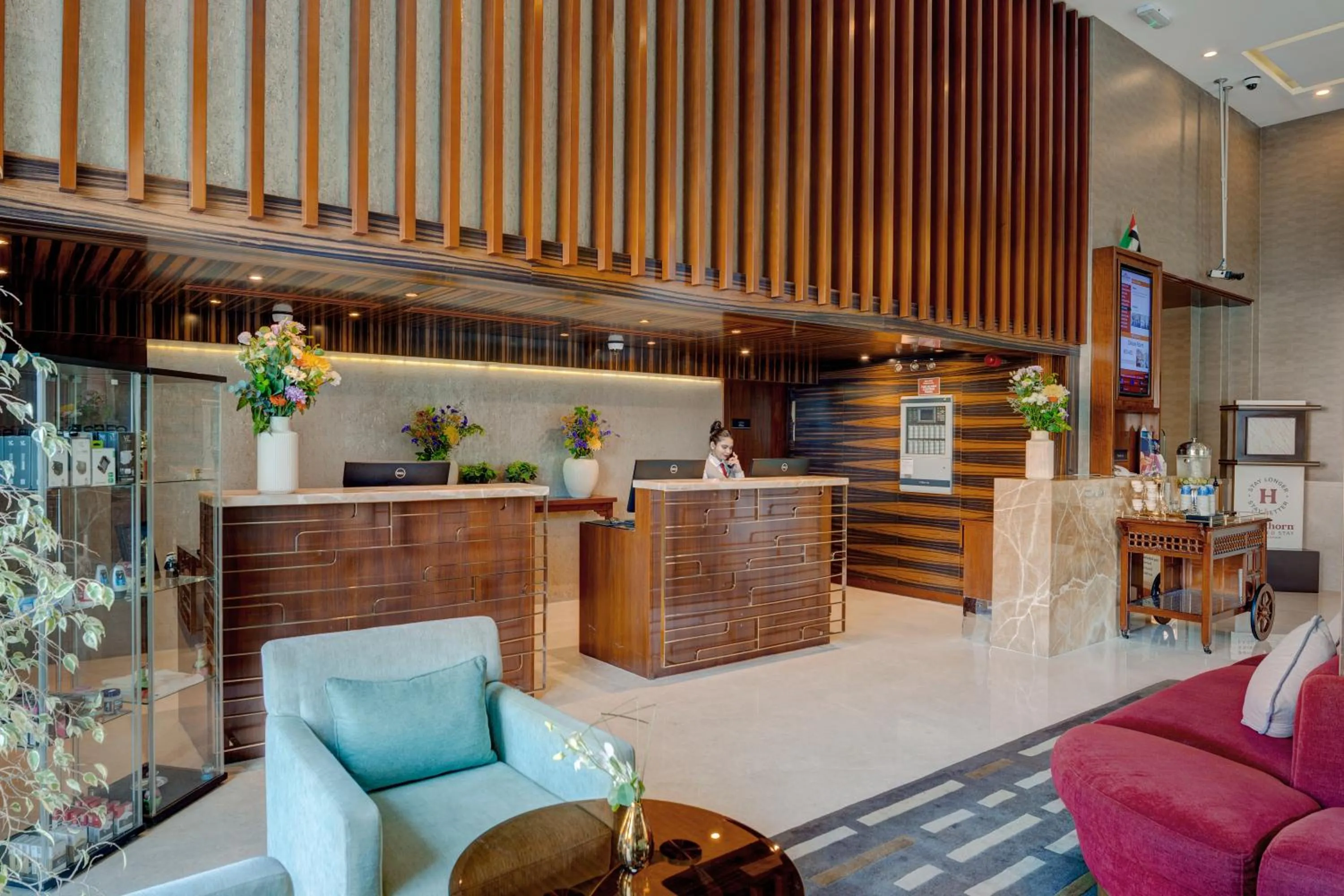 Lobby or reception in Hawthorn Suites by Wyndham Abu Dhabi City Center