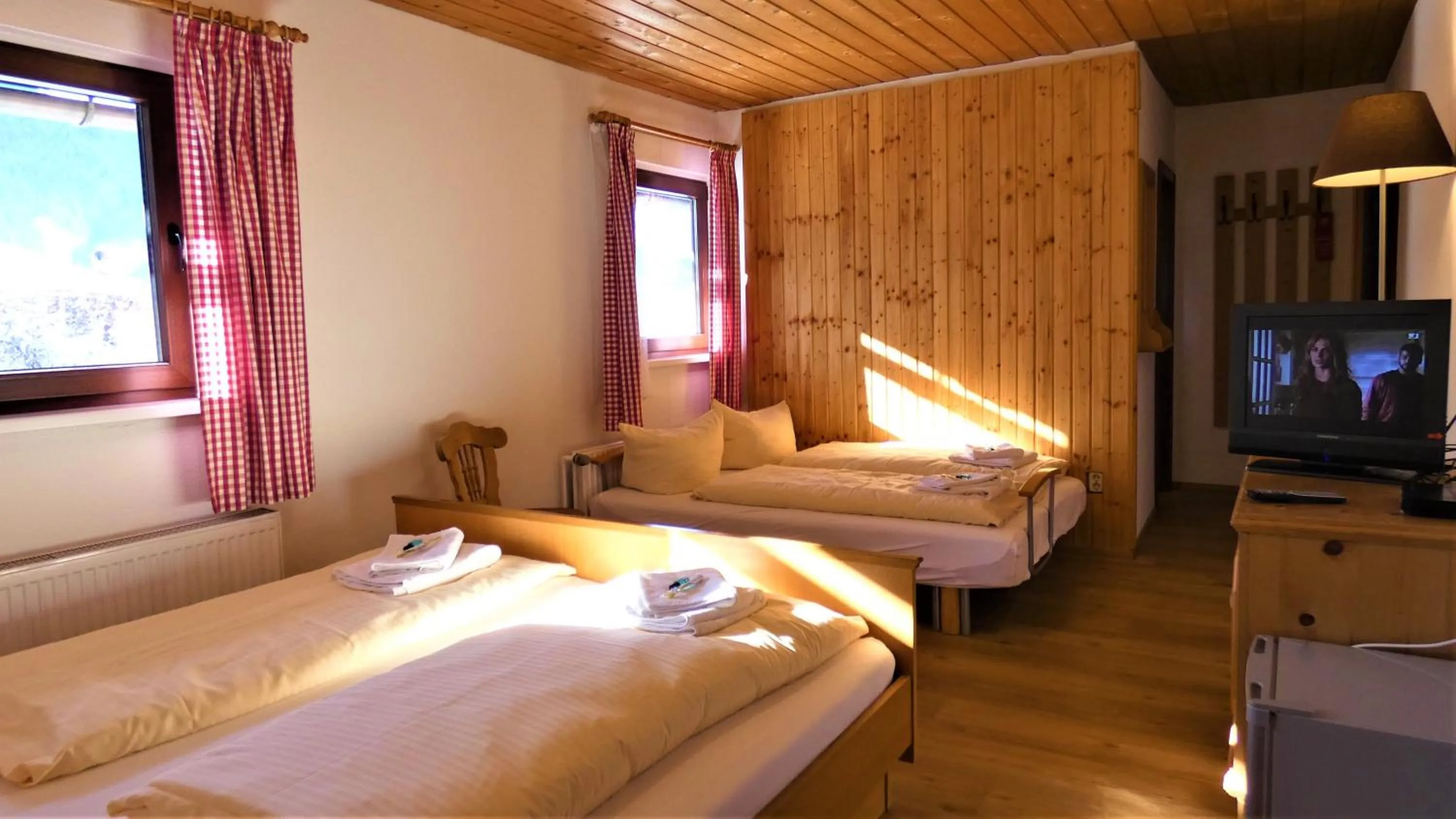 Photo of the whole room, Bed in Sporthotel Schönau am Königssee