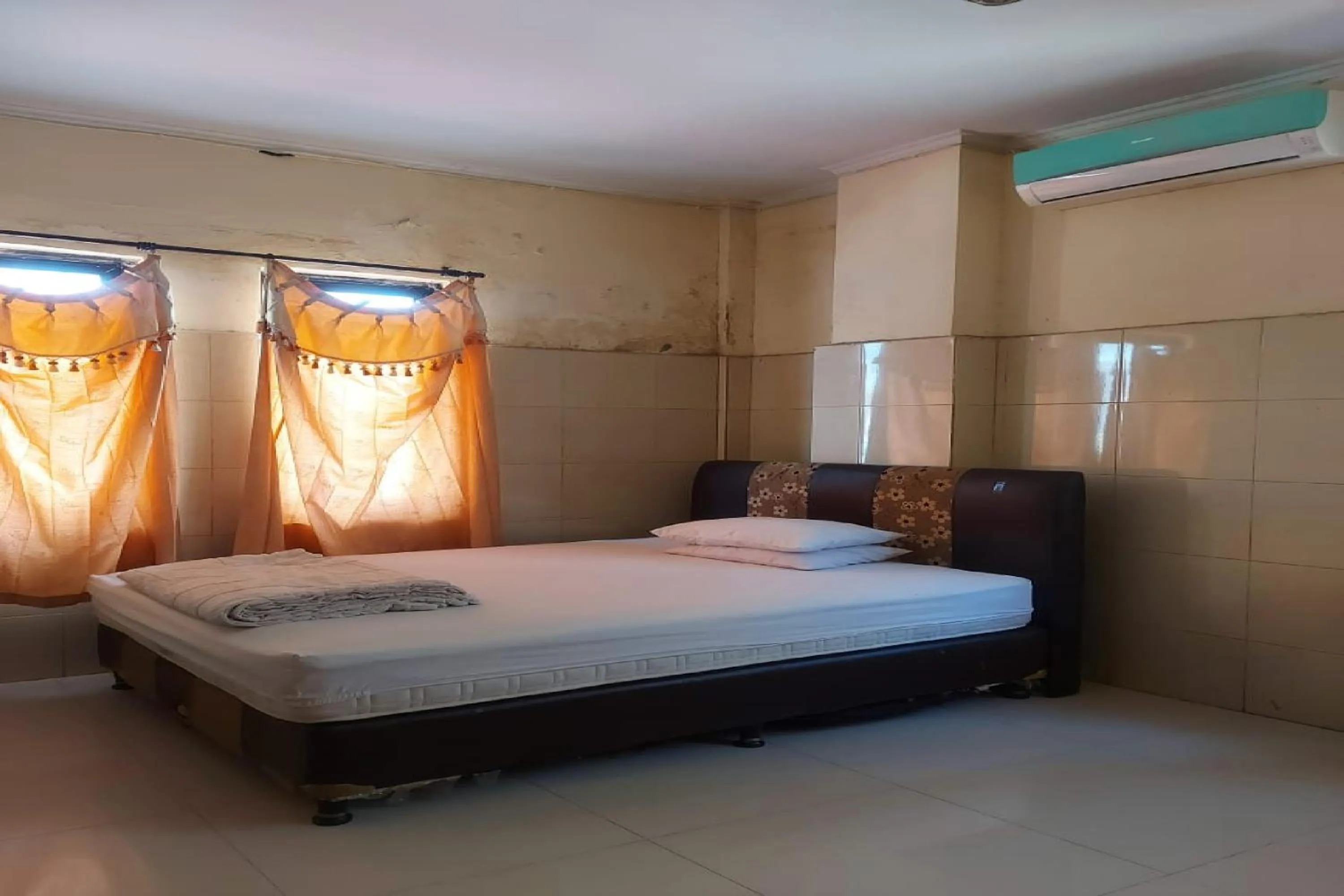 Bedroom, Bed in Hotel Mulia Kendari Mitra RedDoorz
